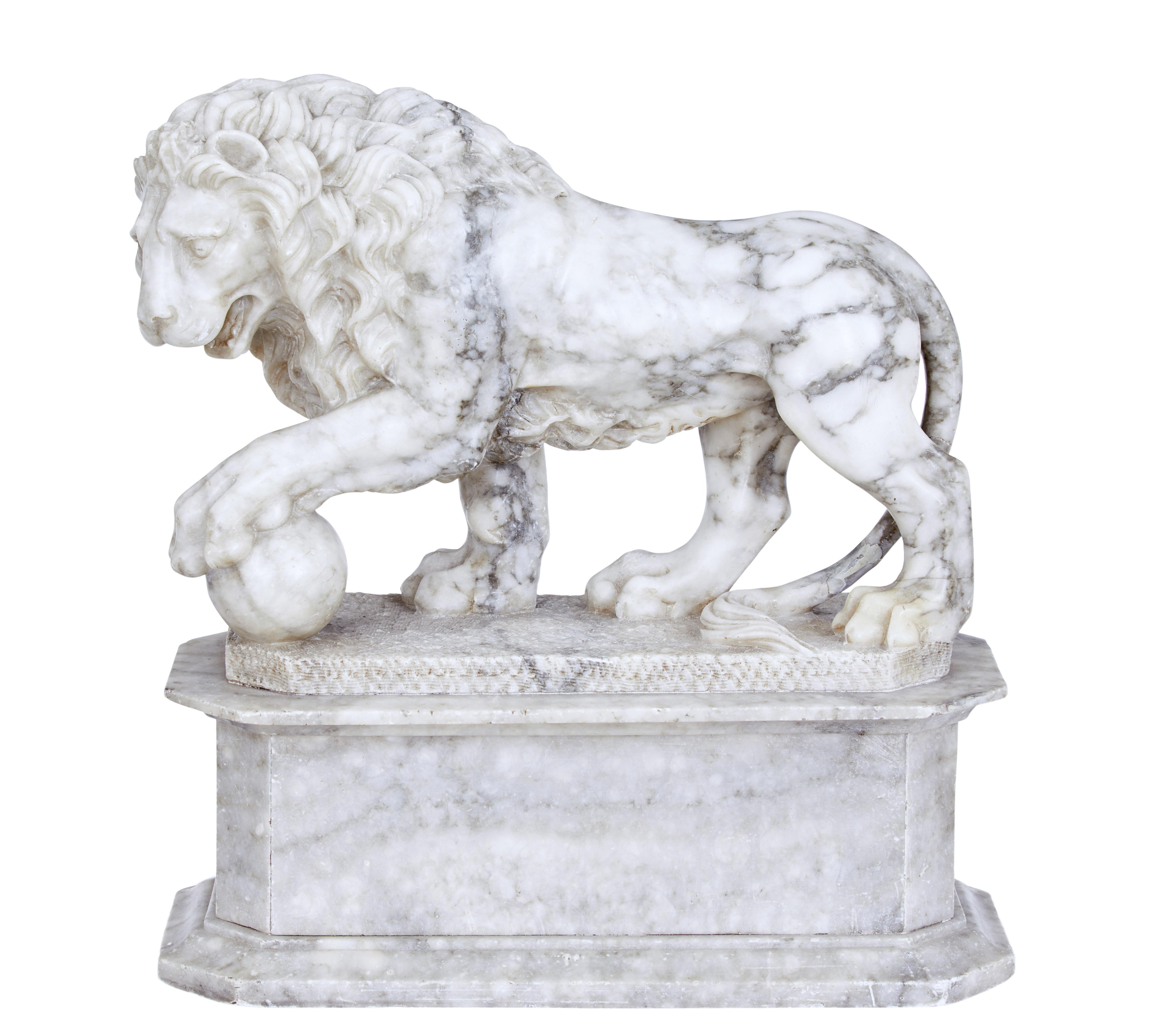 Mid-19th century Italian grand tour marble statue, circa 1860.

Fine quality white marble with grey veining carved lion with 1 foot on a ball. The lion is in a standing position with the ball re-presenting the world.

Standing on an
