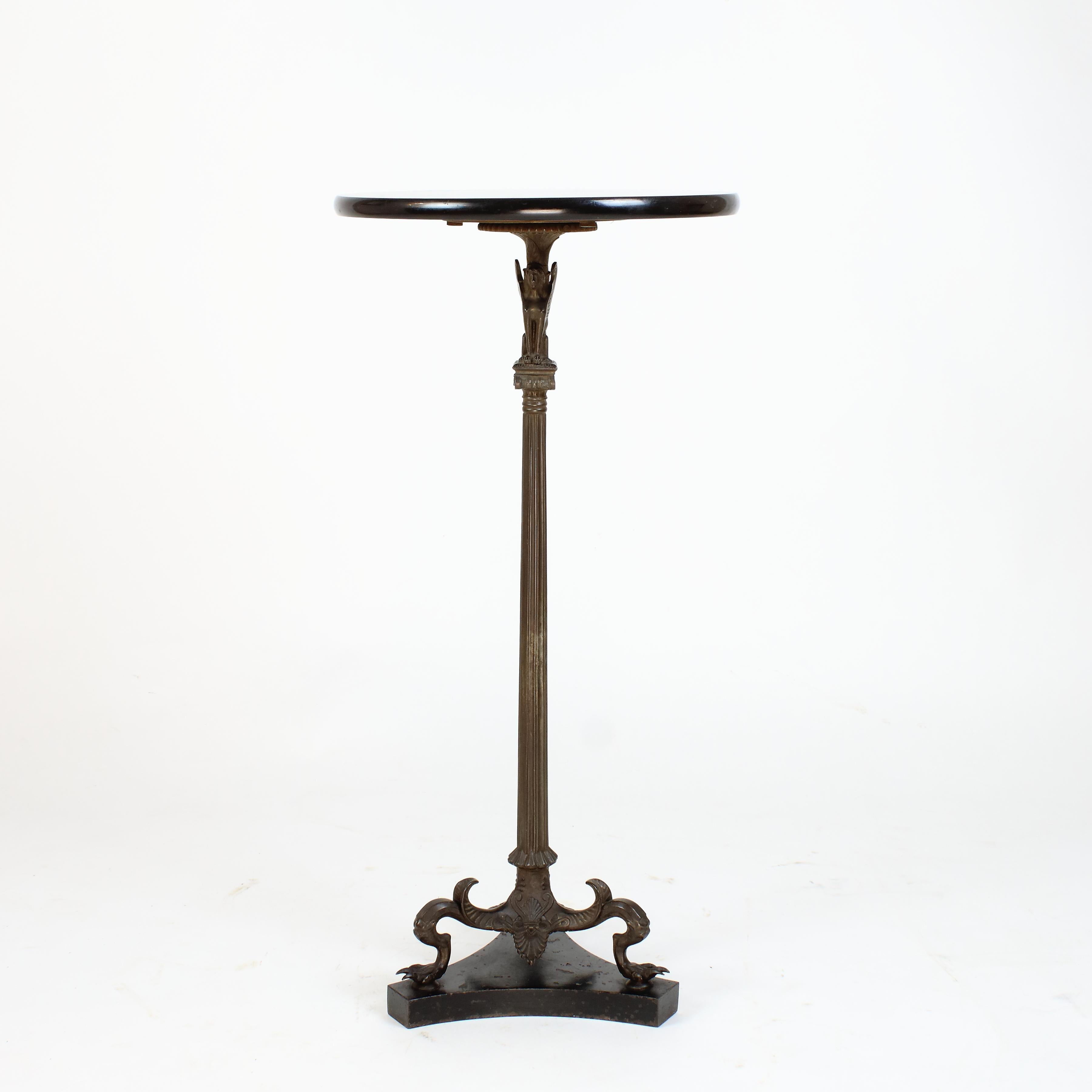 Mid 19th Century Italian Empire Patinated Bronze Grand Tour Sphinx Figure Small Table Guéridon

Small Tripod table standing three lizard paw feet which rest on a tripod plinth. Slender and fluted tapering columnar stem with an Ionic capital