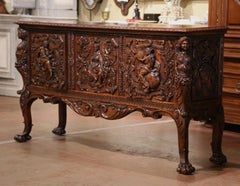 19th Century Italian Renaissance Carved Walnut Credenza with Figures & Paw Feet
