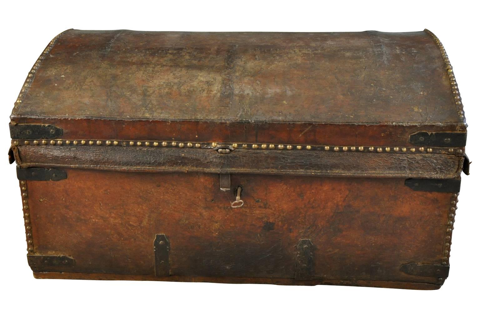 A very handsome mid-19th century trunk, malle from Northern Italy. Wonderfully constructed from leather with iron bindings. Terrific patina.