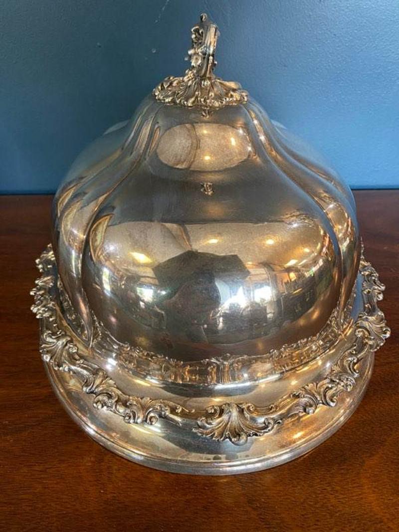 Mid-19th century James Dixon & Sons English Sheffield silver plated meat dome 
Elegant, intricate and classic. Stamped with 