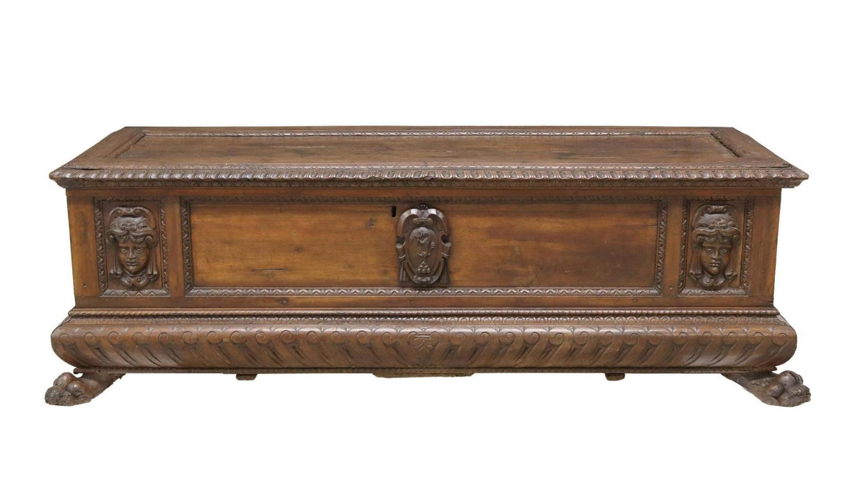 Large Antique Italian Renaissance style walnut cassone/ storage coffer, 18th c. This chest features a rectangular coffered top, with running ornamentation border, opening to storage interior, over front carved with central cartouche and figural