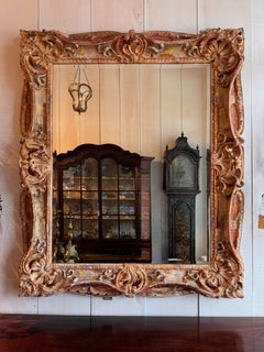 Mid 19th Century Large Carved Mirror With Distressed Polychrome Finish