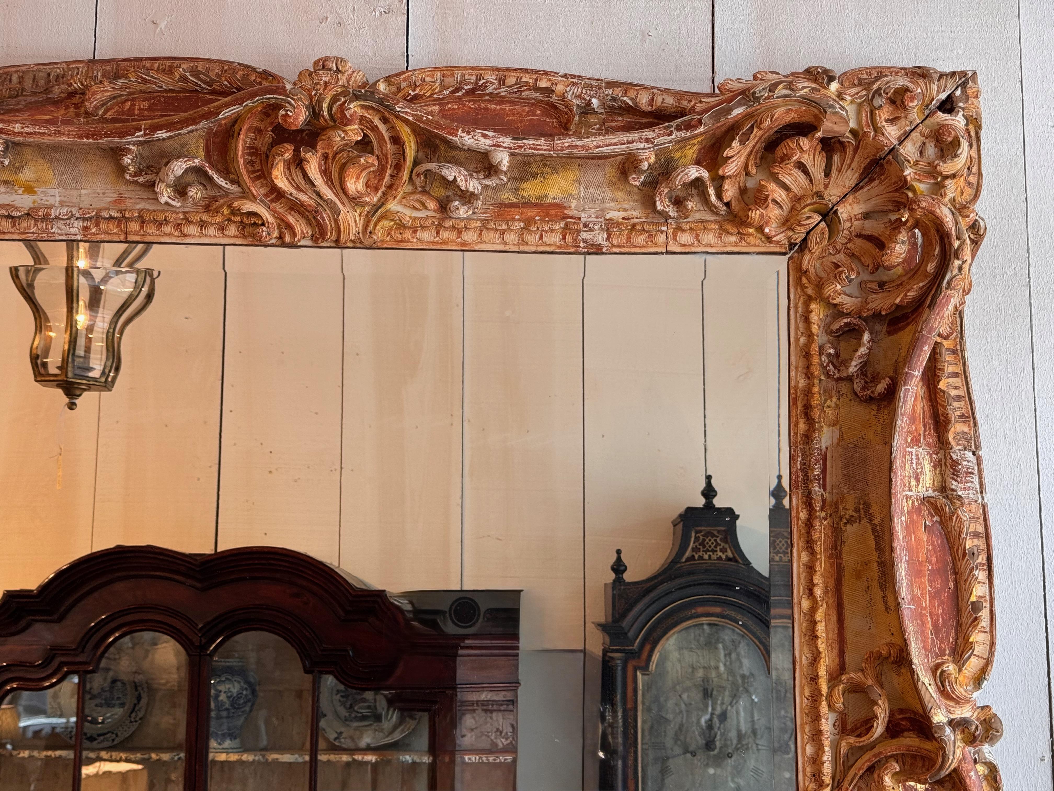 Mid 19th Century Large Carved Mirror With Distressed Polychrome Finish In Good Condition For Sale In Charlottesville, VA