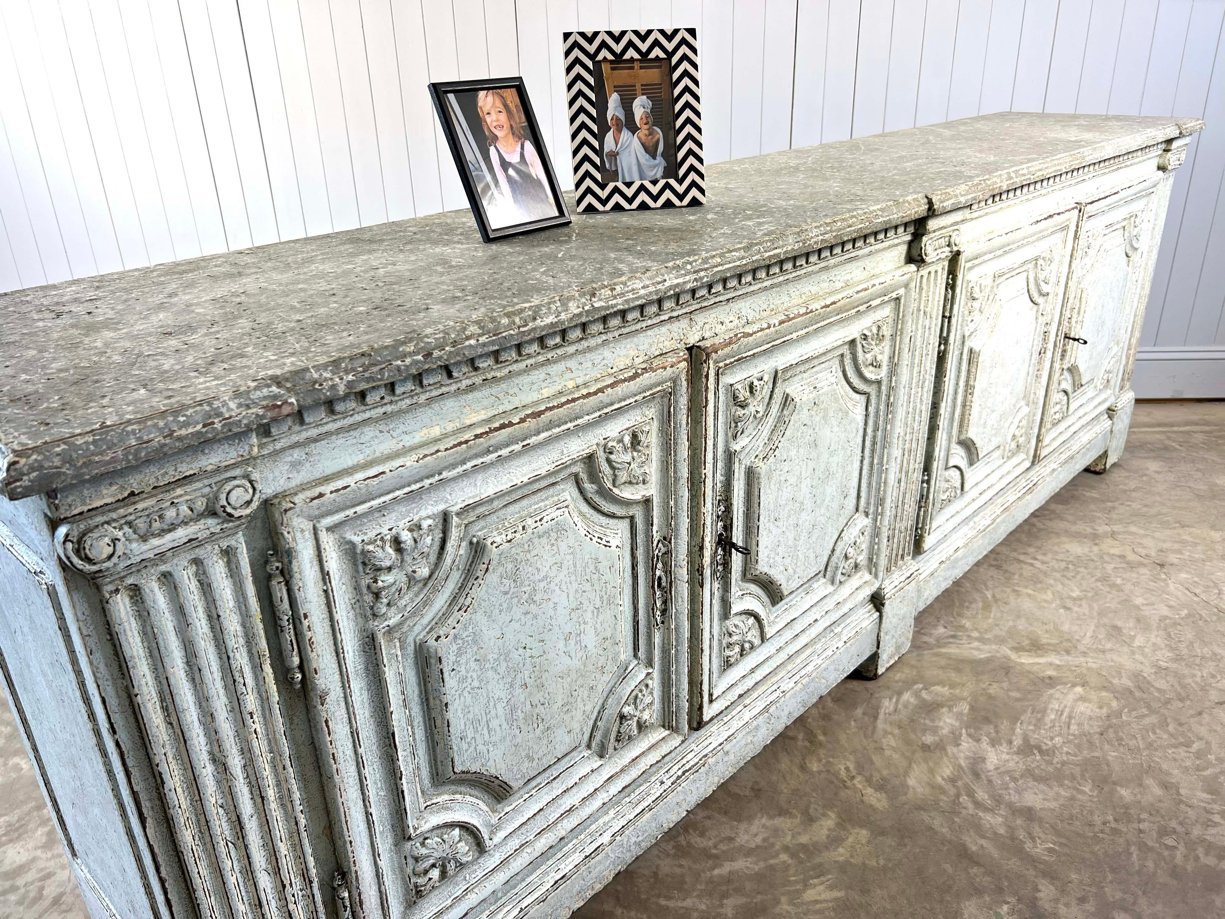 This stunning oak sideboard is mid 19th Century, the style is Louis XVI - the paint is new.  

Wonderful details throughout and having been fully restored everything works as it should, complete with keys and restored locks.  Some new components