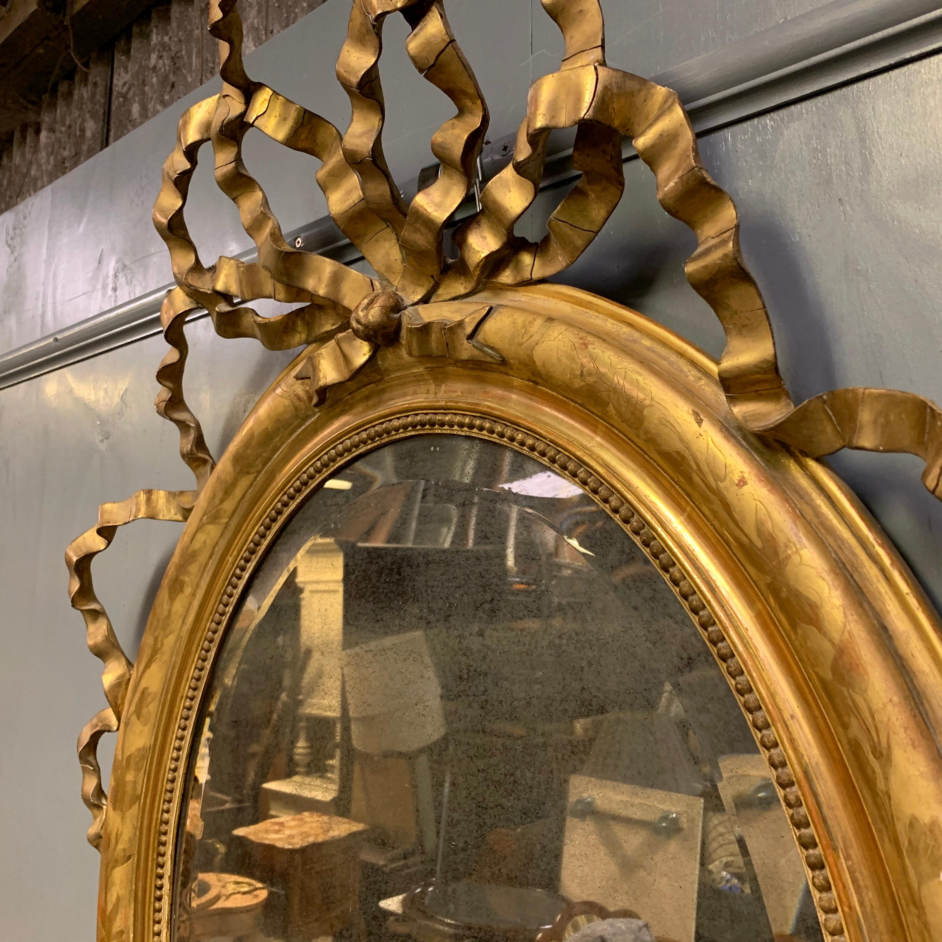 Softwood Mid-19th Century Large French Oval Gilt Mirror with Ribbon Cartouche