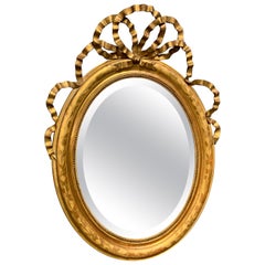Mid-19th Century Large French Oval Gilt Mirror with Ribbon Cartouche
