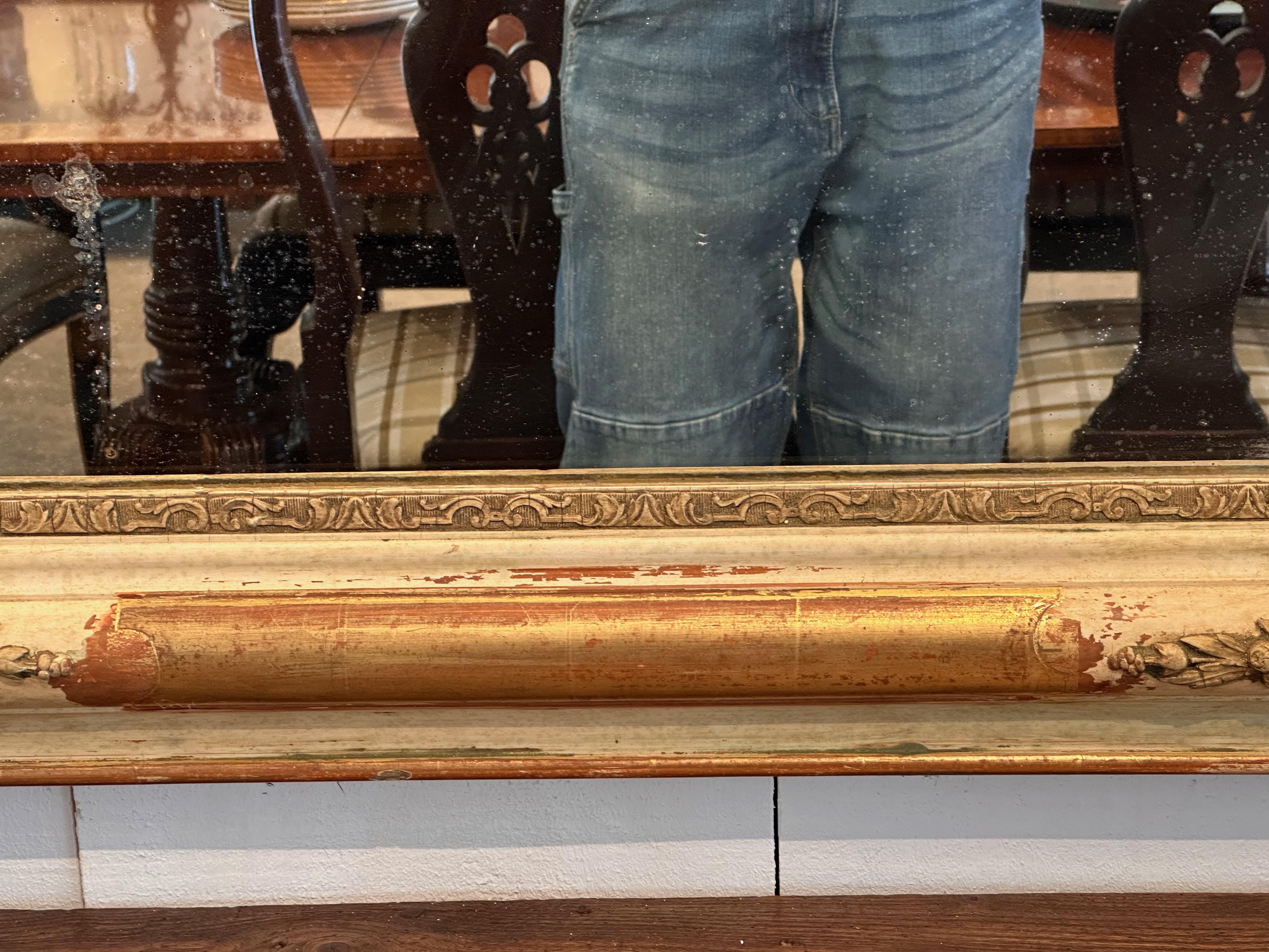 A large Louis Phillippe mirror. Nice relief and color.

