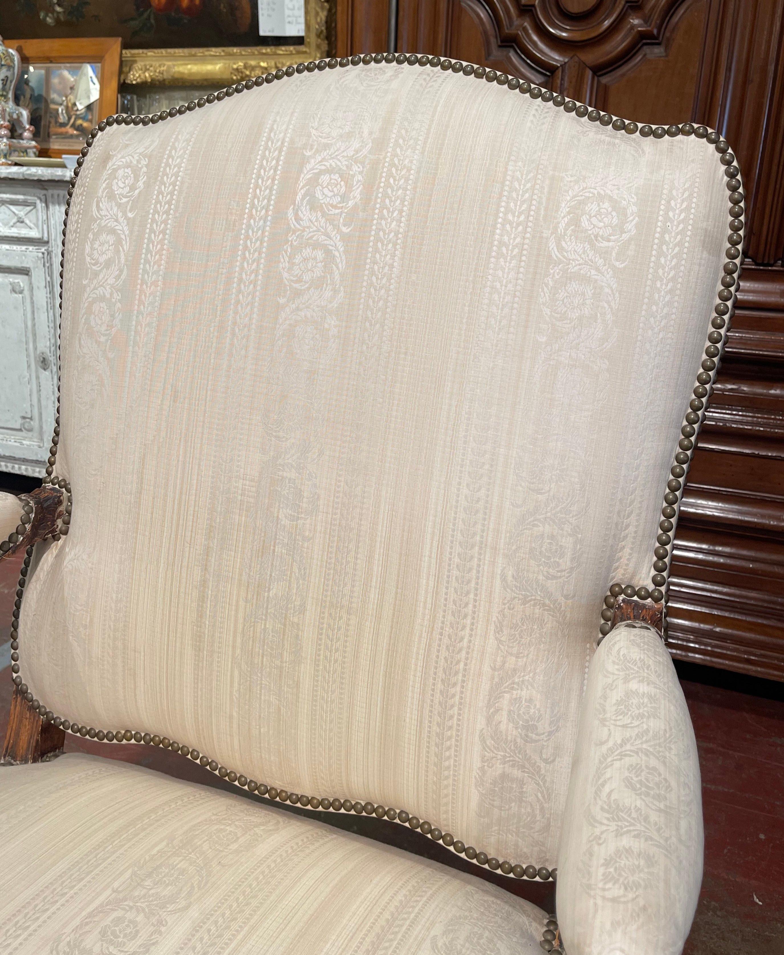 Fabric Mid-19th Century Louis XV Carved Walnut Upholstered Armchair from Provence For Sale