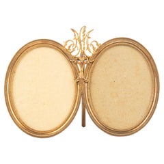 Antique Mid-19th Century Louis XVI Style Ormolu Gilt Bronze Oval Double Picture Frame