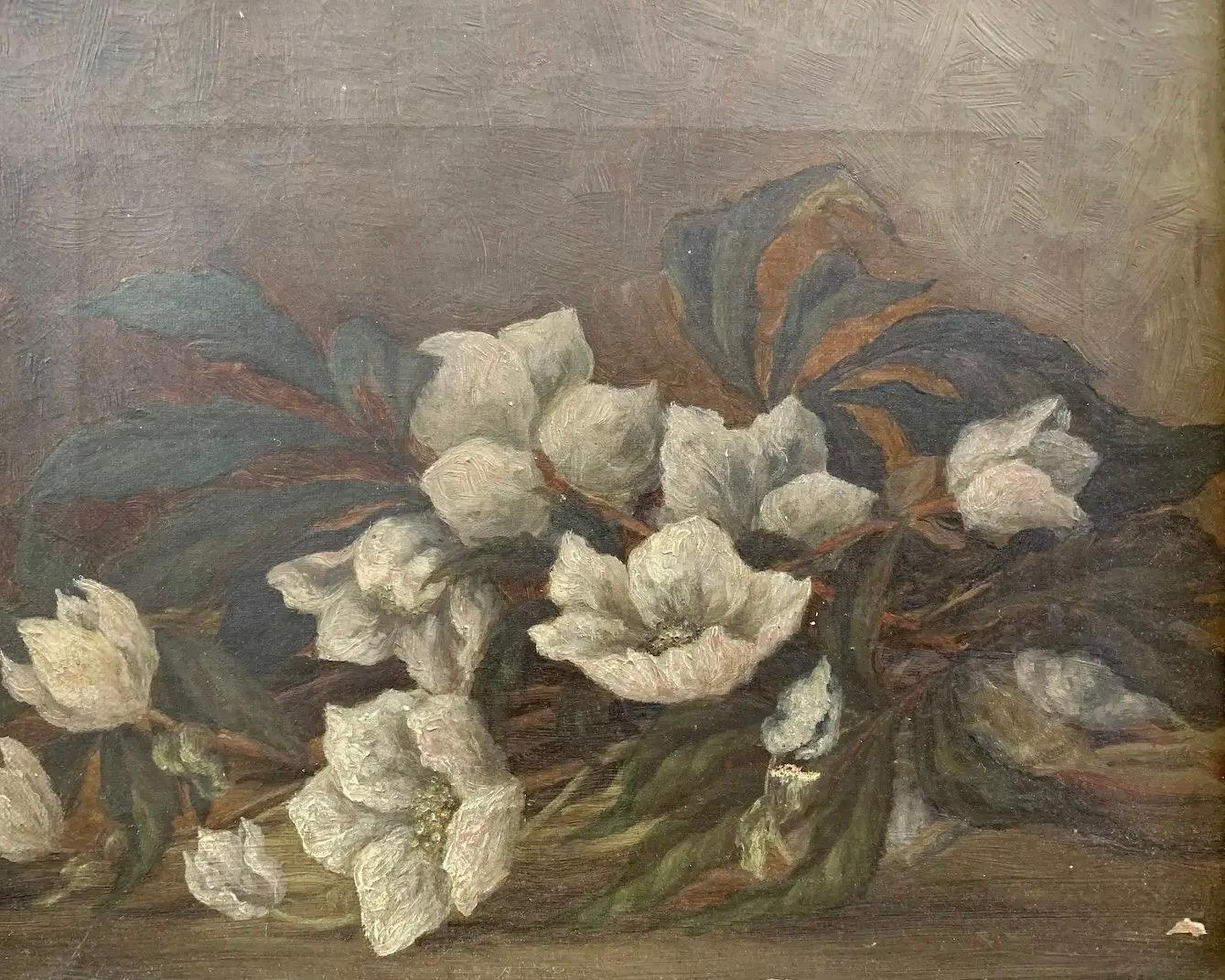 From the world renowned Portobello Market in London, this authentic antique oil painting, circa 1840, features a casual floral arrangement in a muted color scheme showcased in an ornately carved giltwood and gesso frame of the period displaying