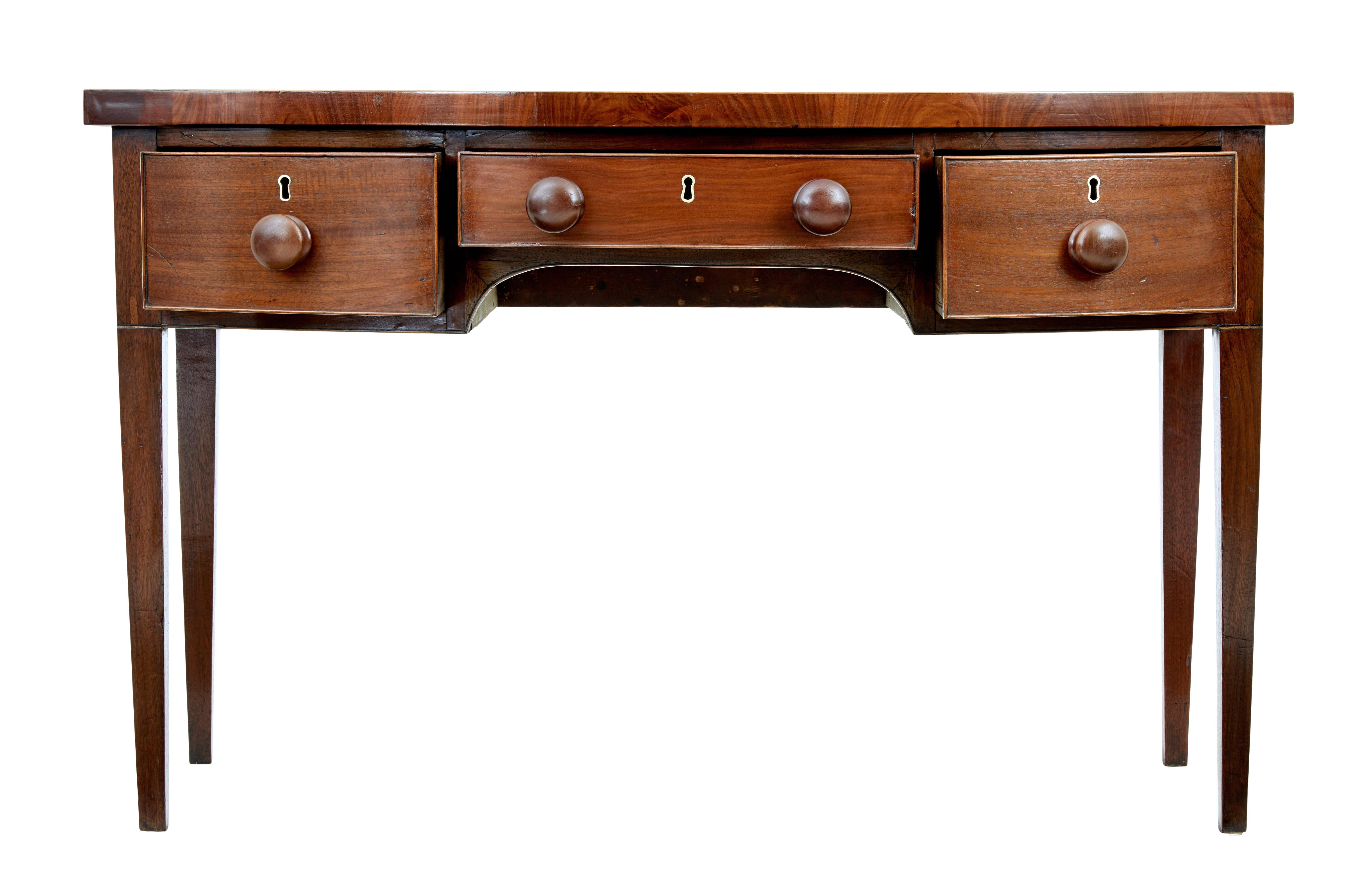 Mid 19th century mahogany bowfront sideboard circa 1850.

Good quality bowfront sideboard/serving table from the mid 19th century.

1 piece mahogany top, showing the whole grain of the tree, with a boxwood strung detailing around the outer edge.