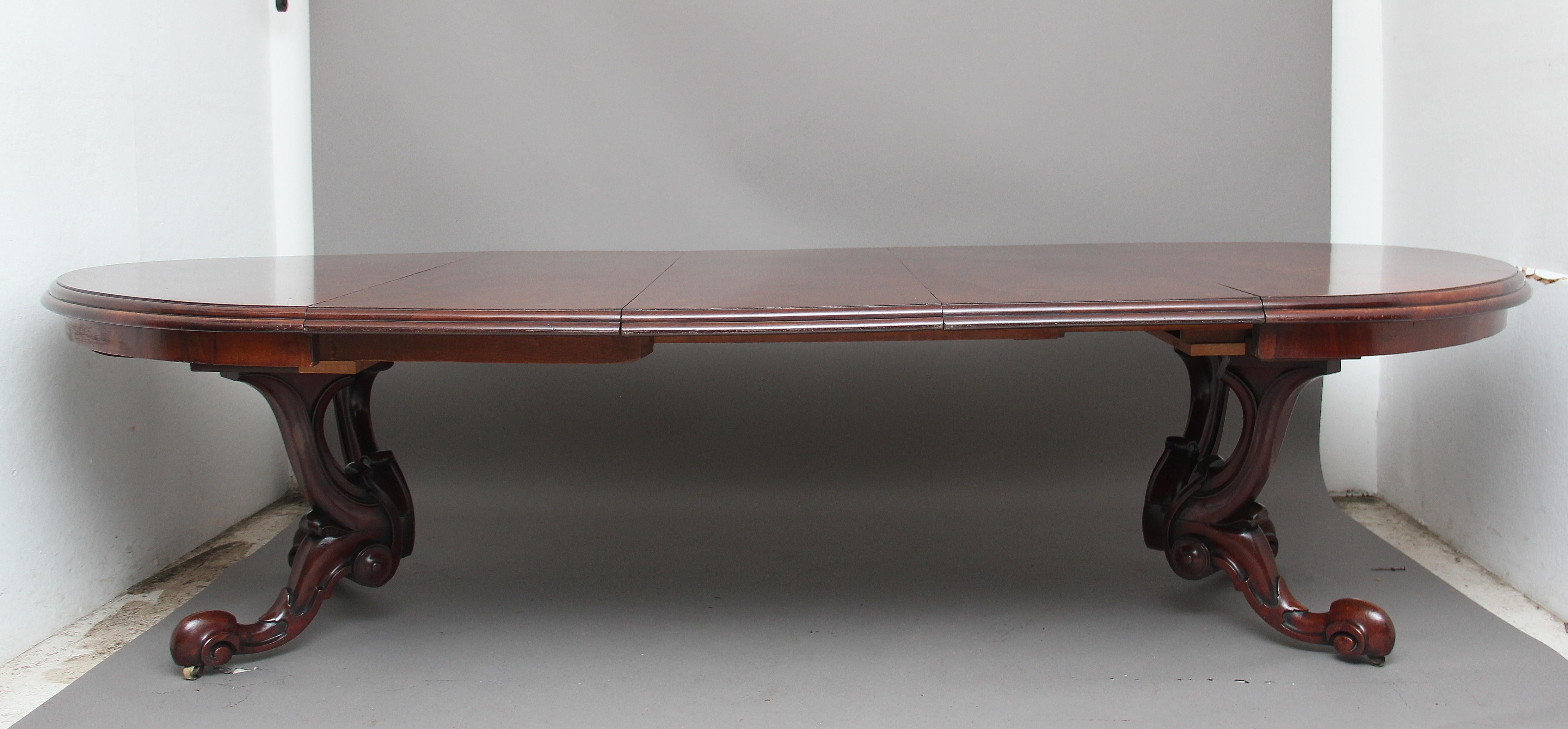 Mid-19th century mahogany dining table with three leaves, staring at 54” diameter (137cms diameter) extending to 111” (282cms) having a lovely figured top with nice moulded edge supported on an unusual carved and swept base. Fantastic colour and in