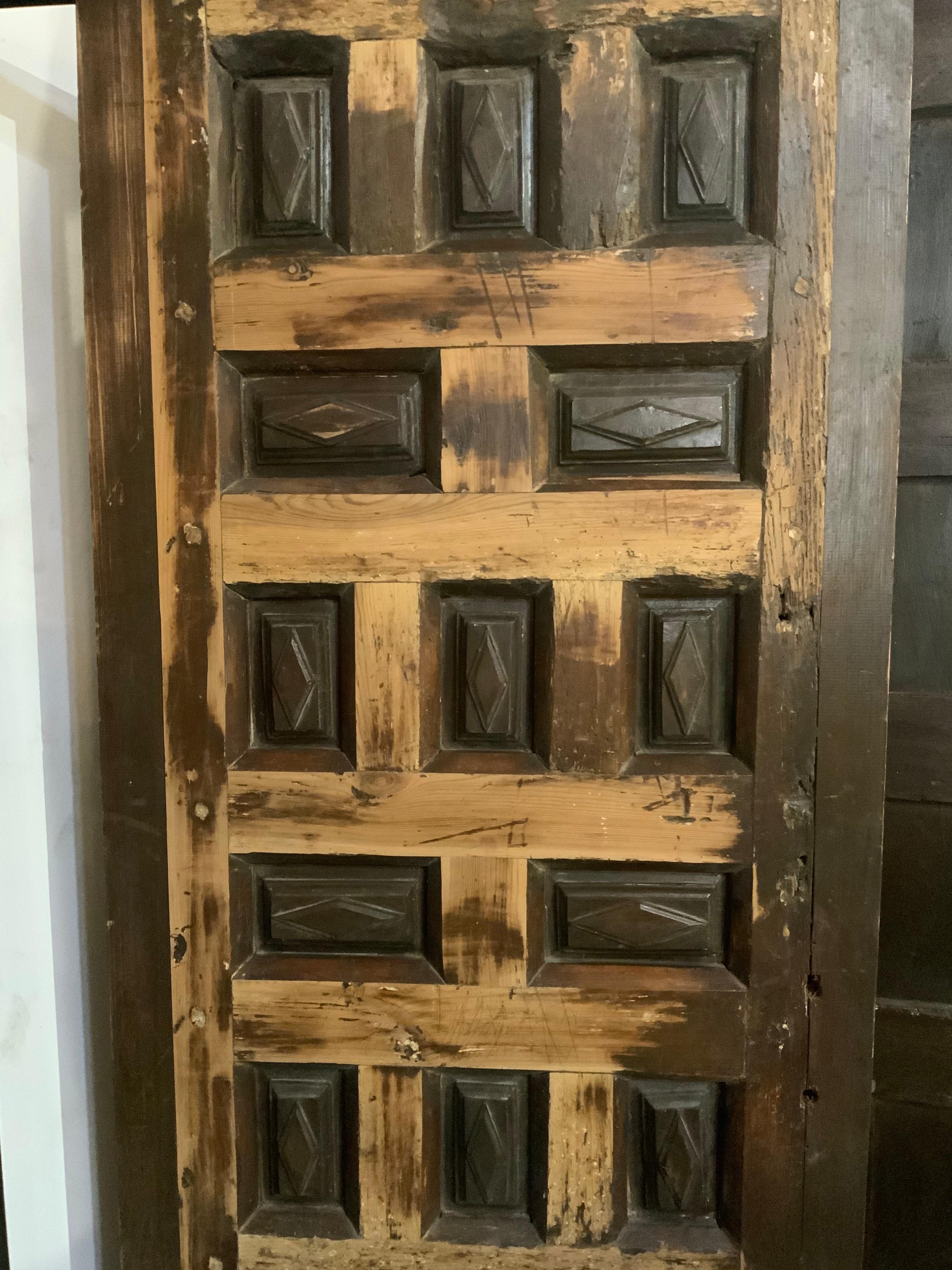 This maple door origins from Spain, circa 1850.