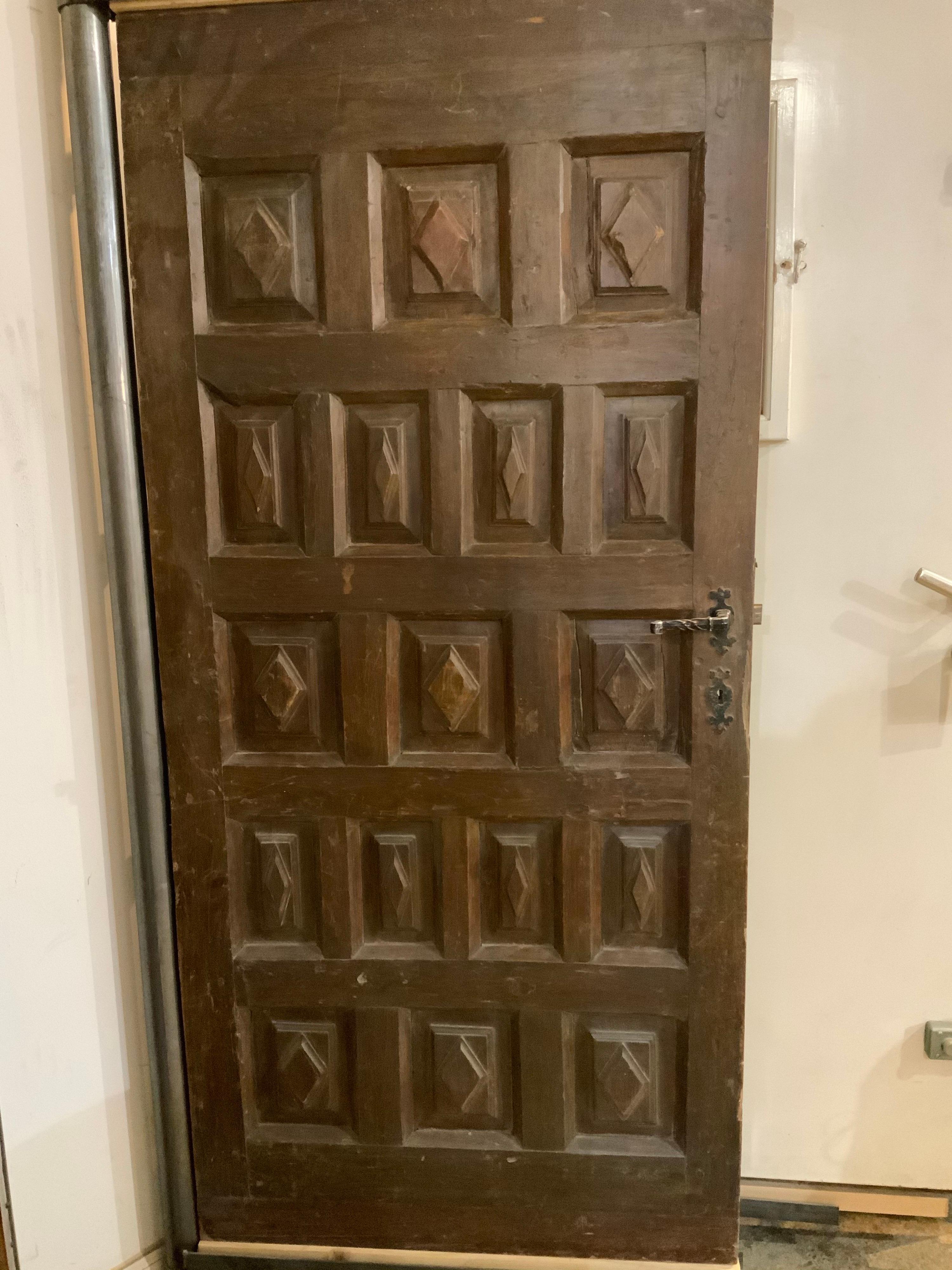 This maple door origins from Spain, circa 1850.