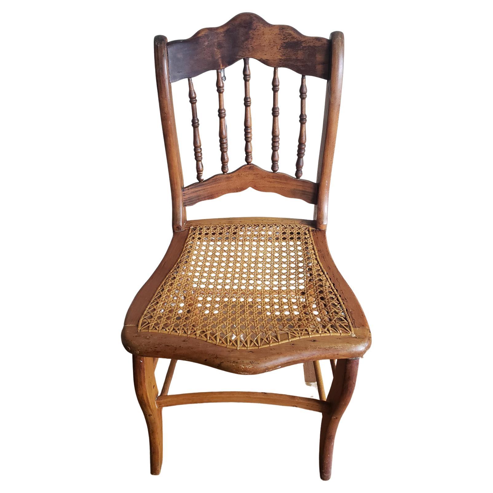 Civil War Era solid maple caned seat chair. Caning in good condition.. Vintage Solid Wood, Cane Seat Dining Side Accent Chair. truly antique furniture with 5 spindle back. One of the spindles appears to have been nicely repaired.

Measures 17