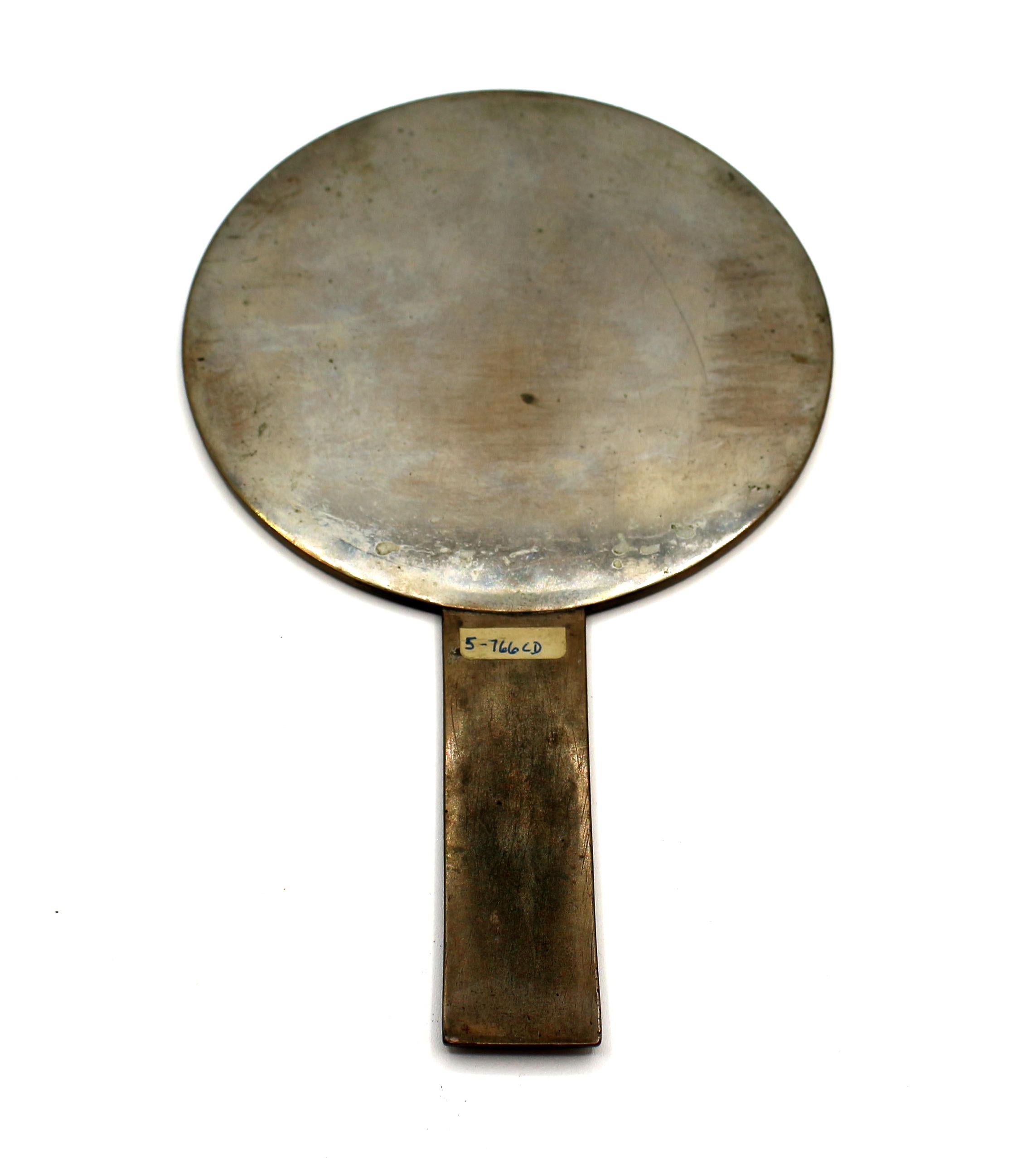 Mid-19th century Meiji period bronze hand mirror. Floral decoration with artist inscription & signature amongst the water lillies.

Measures: 9 3/4