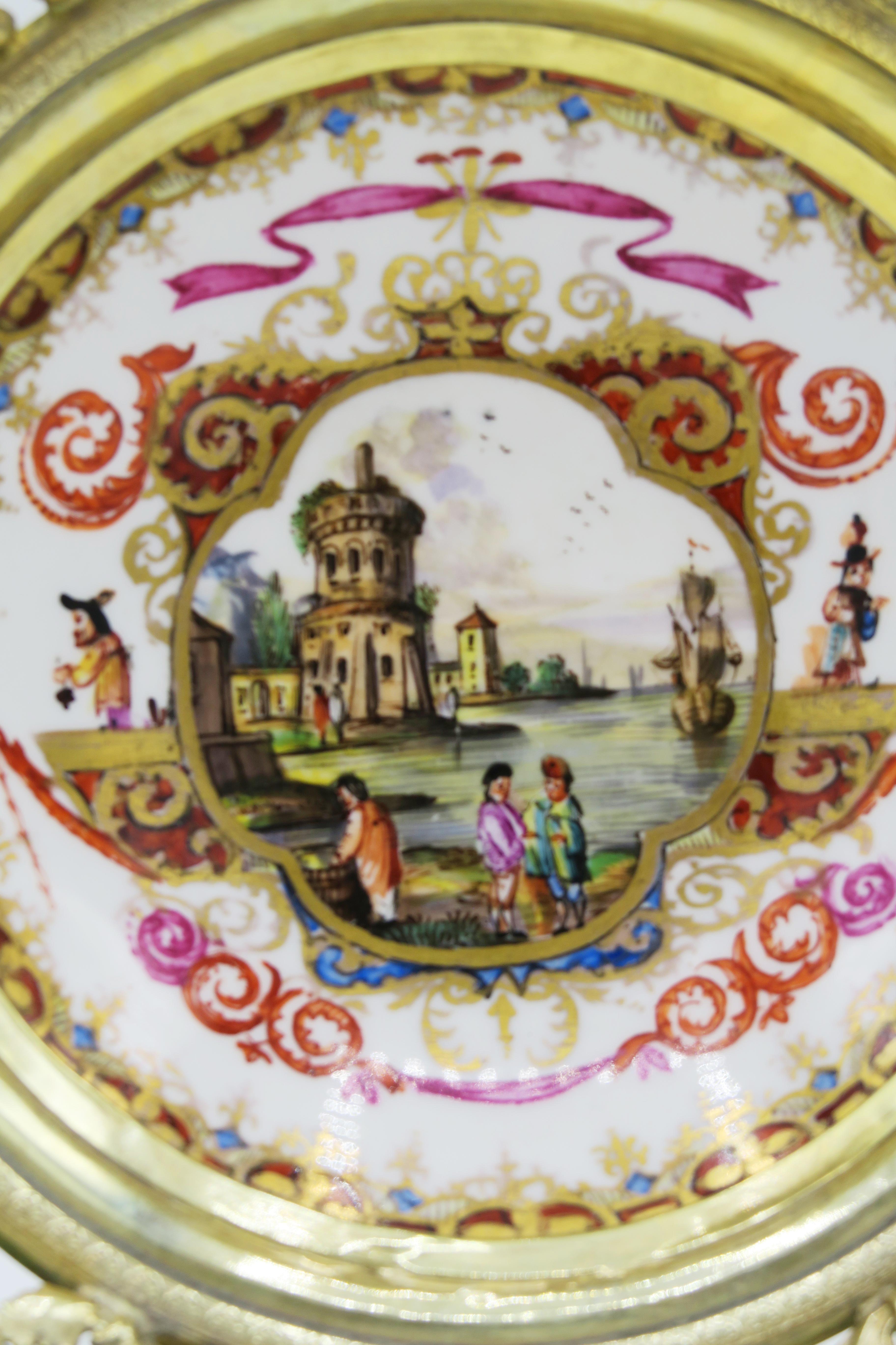 Mid-19th century Meissen plate with landscape painting and hollow gilded frame
In the middle of the plate is painted 