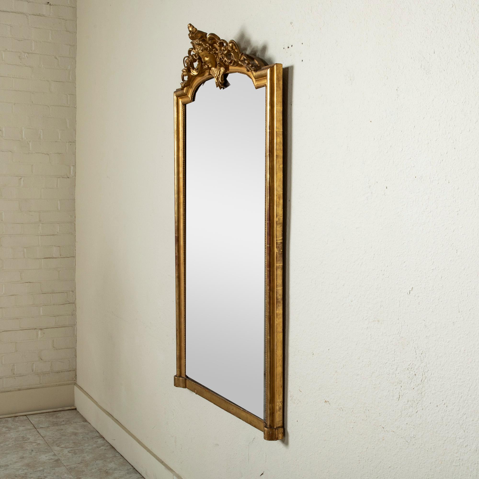 Mercury Glass Mid-19th Century Napoleon III Period French Gilt Wood Mantel Mirror with Mask For Sale