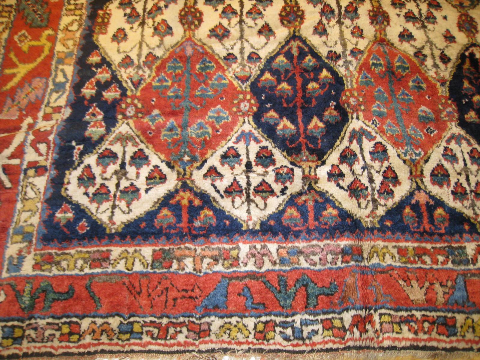 A mid-19th century Senna-Kurd Gallery carpet from northwest Persia in excellent overall condition, measures 13' 9