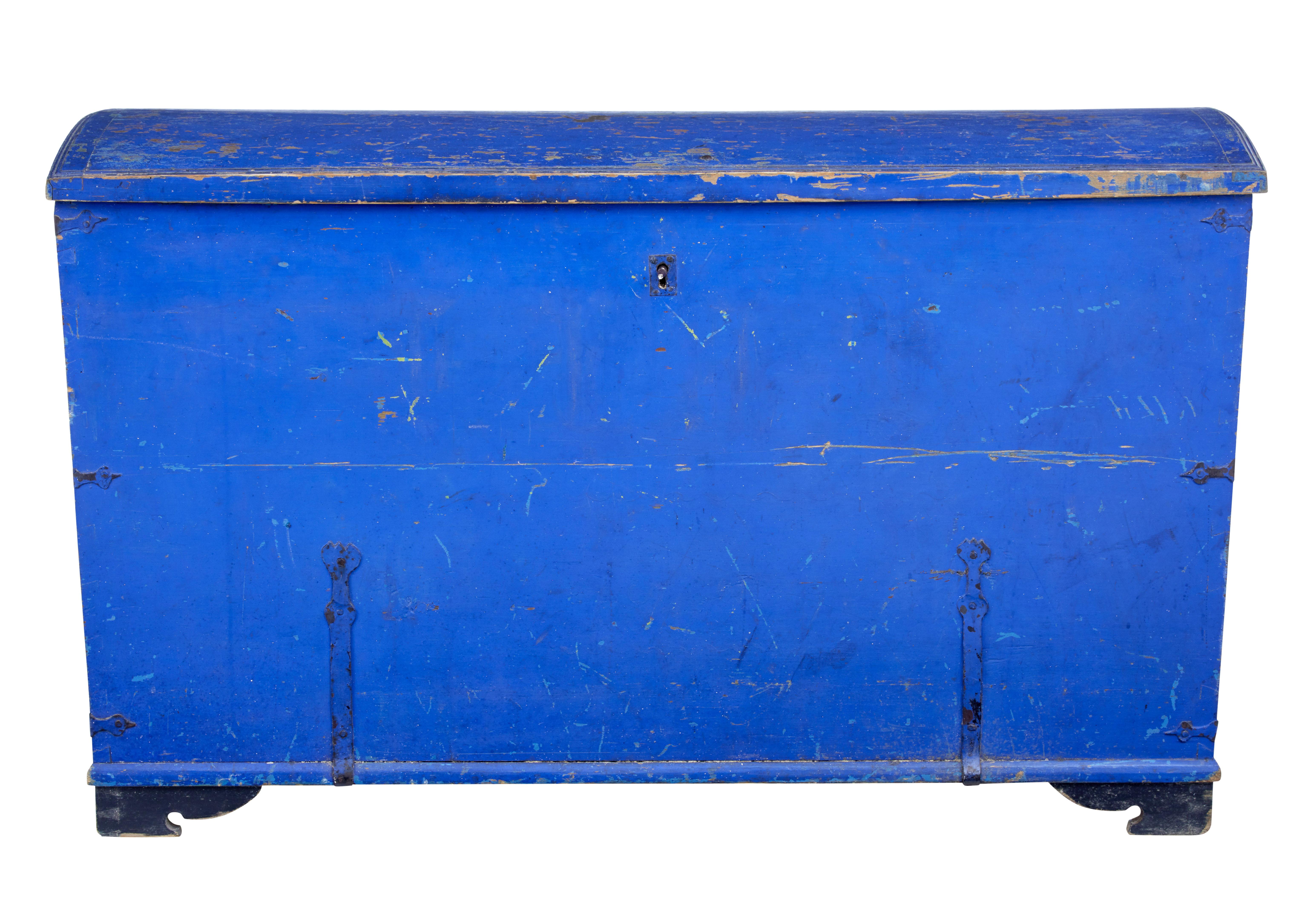 Rustic Swedish painted pine blanket box, circa 1866.

Signed with a name inside the lid and a date of 1866. Painted in a period vivid blue colour and black painted bracket feet.

Metal handles to each side, with metal decorative strap work.