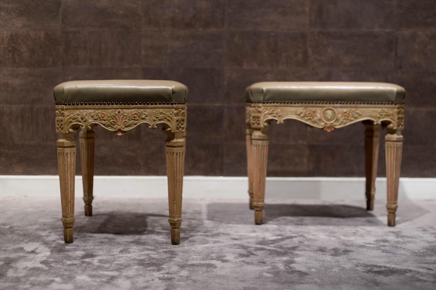 This highly elegant pair of benches is in Louis XVI style, made in the mid-19th century.
The four legs are tapered in a truncated pyramidal shape, and the band is decorated with polychrome carvings with floral motifs interspersed with decorative