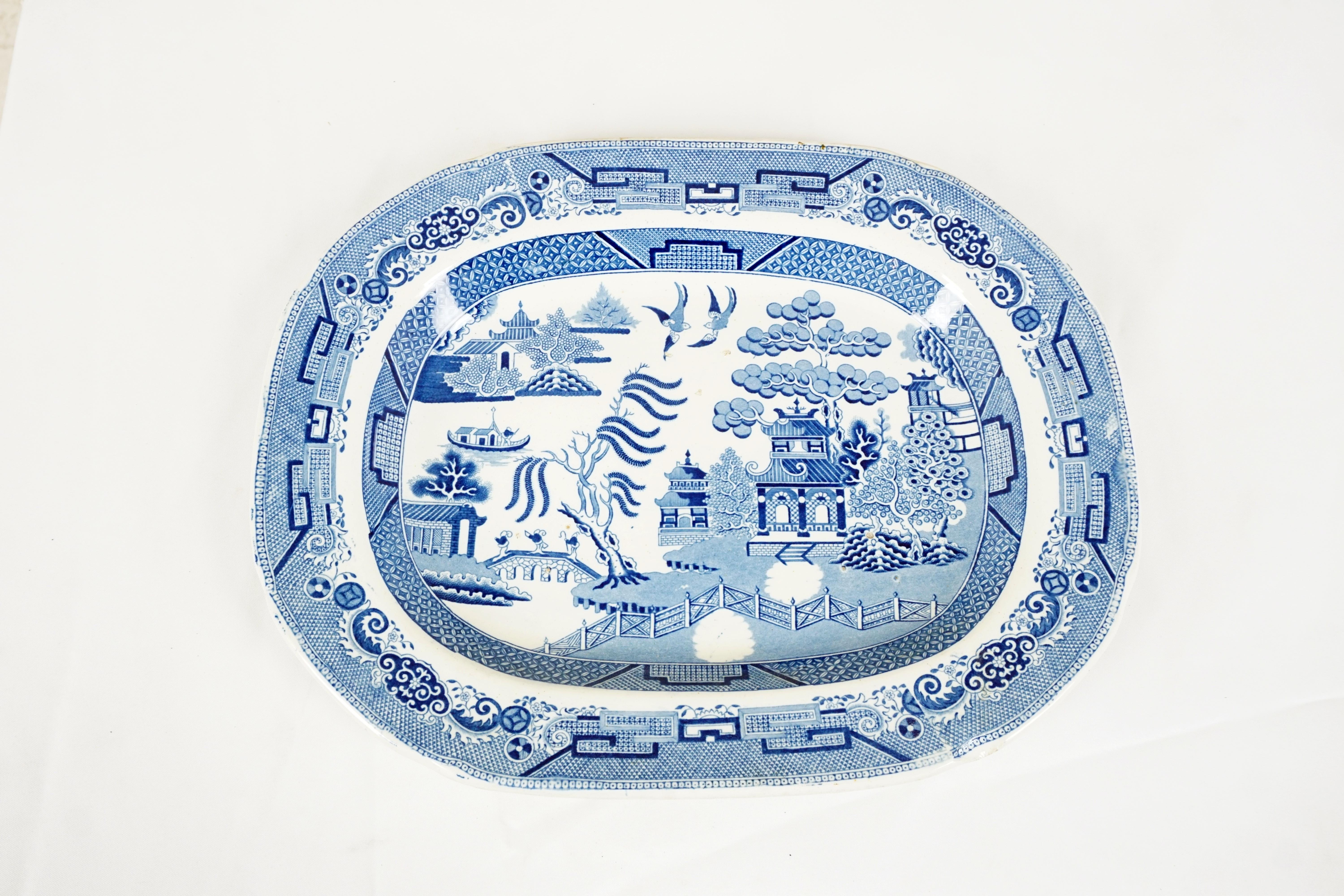 Mid 19th century pearlware blue willow transfer platter, England 1840, H630

England 1890
Tree has well shaped impression into the body and has a blue and white pattern
Vivid colors
Marked on the underside



Measures: 16