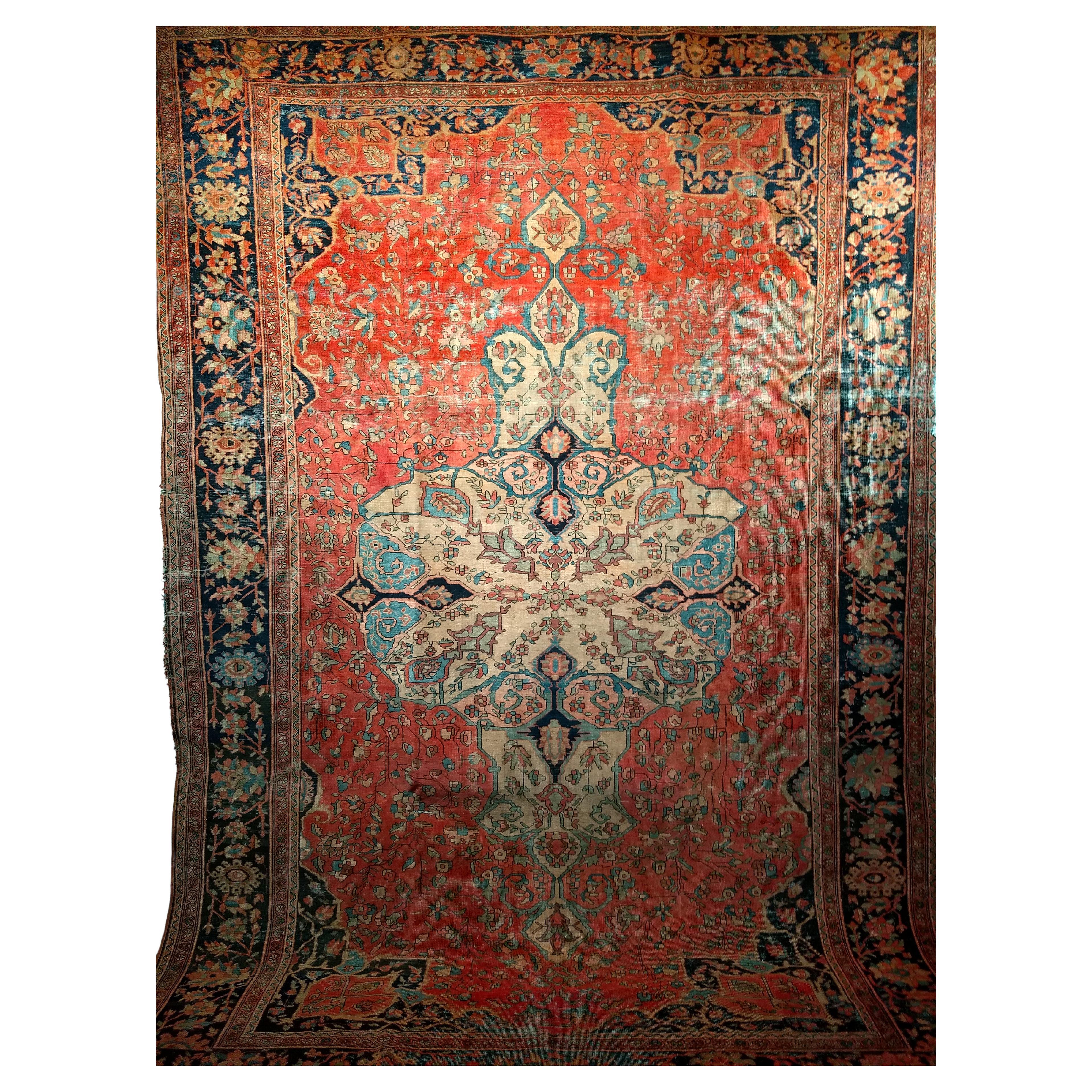  A Persian Farahan room size rug from the late 1800s.  Beauty, sophisticated design, and palate of natural dyes brought together in this Farahan rug with the Persian Garden design has an extremely fine weave. The rug has a red color field with a