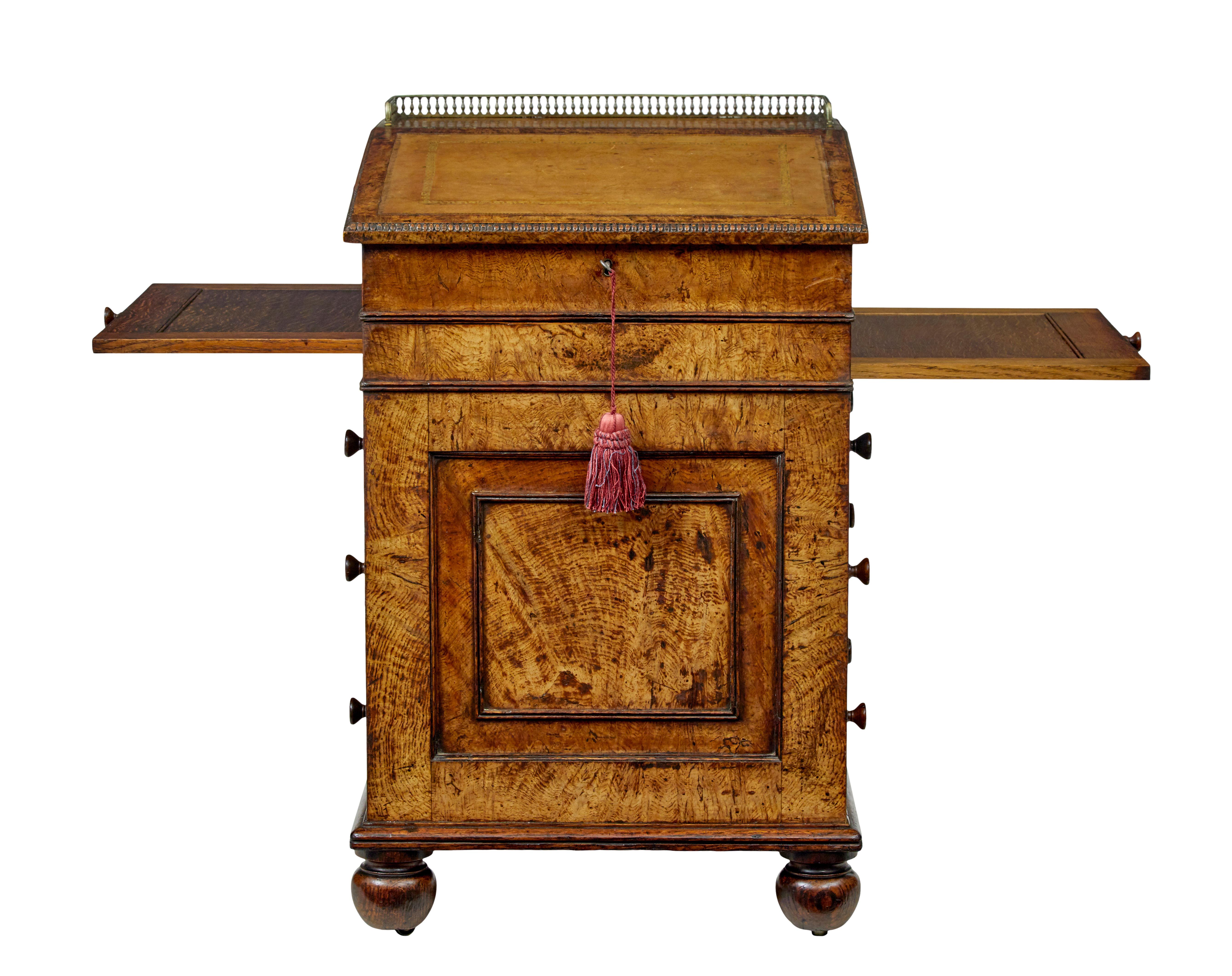 Mid 19th century pollard oak davenport desk circa 1850.

We are pleased to offer this elegant example of a davenport made in pollard oak.

Top surface with original brass gallery, leading down to the brown leather writing surface with gold tooling. 