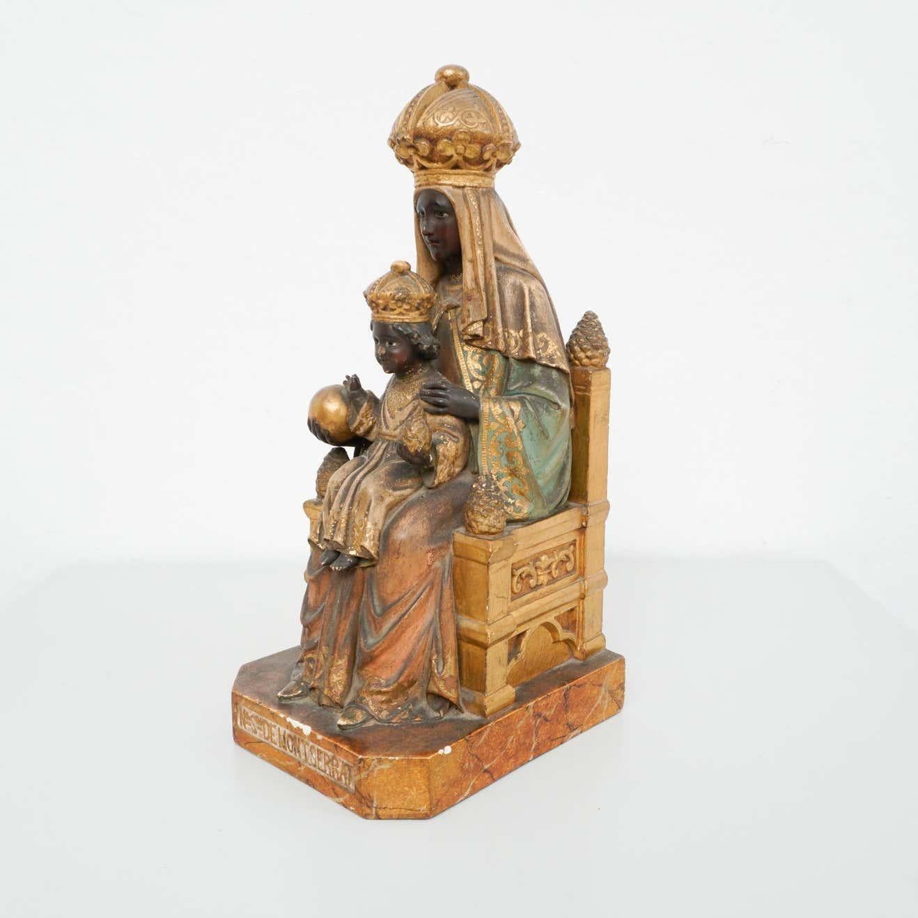 Mid-19th century Spanish polychromed montserrat virgin statue made of painted plaster.  Made in Barcelona, Spain.  Embellished with polychrome finish, the Classic religious figure is beautifully ornate and has wonderful details throughout her robe,