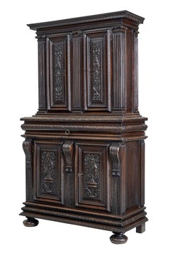 Mid-19th century profusely carved French walnut cabinet