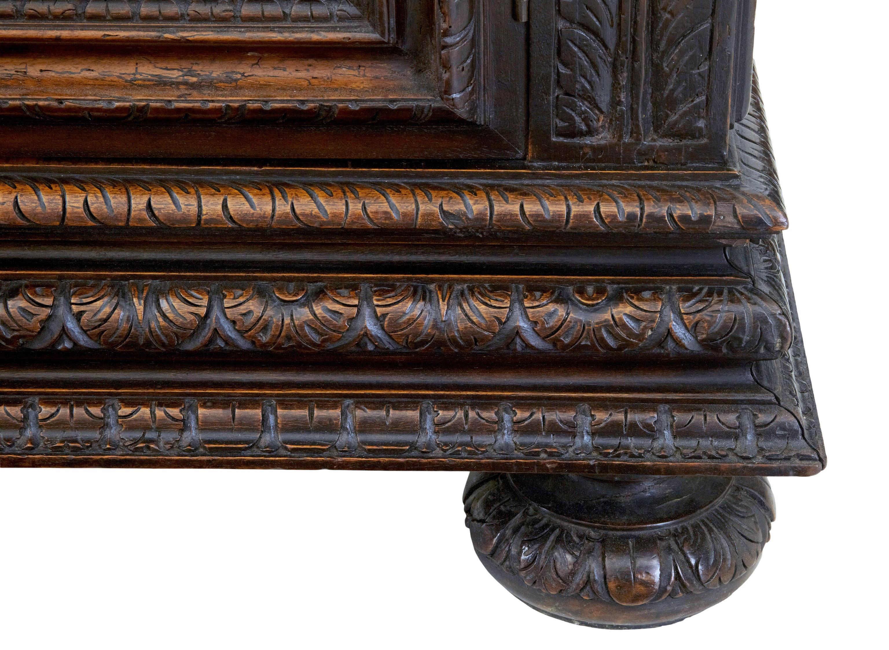 Gothic Revival Mid-19th century profusely carved French walnut cabinet For Sale