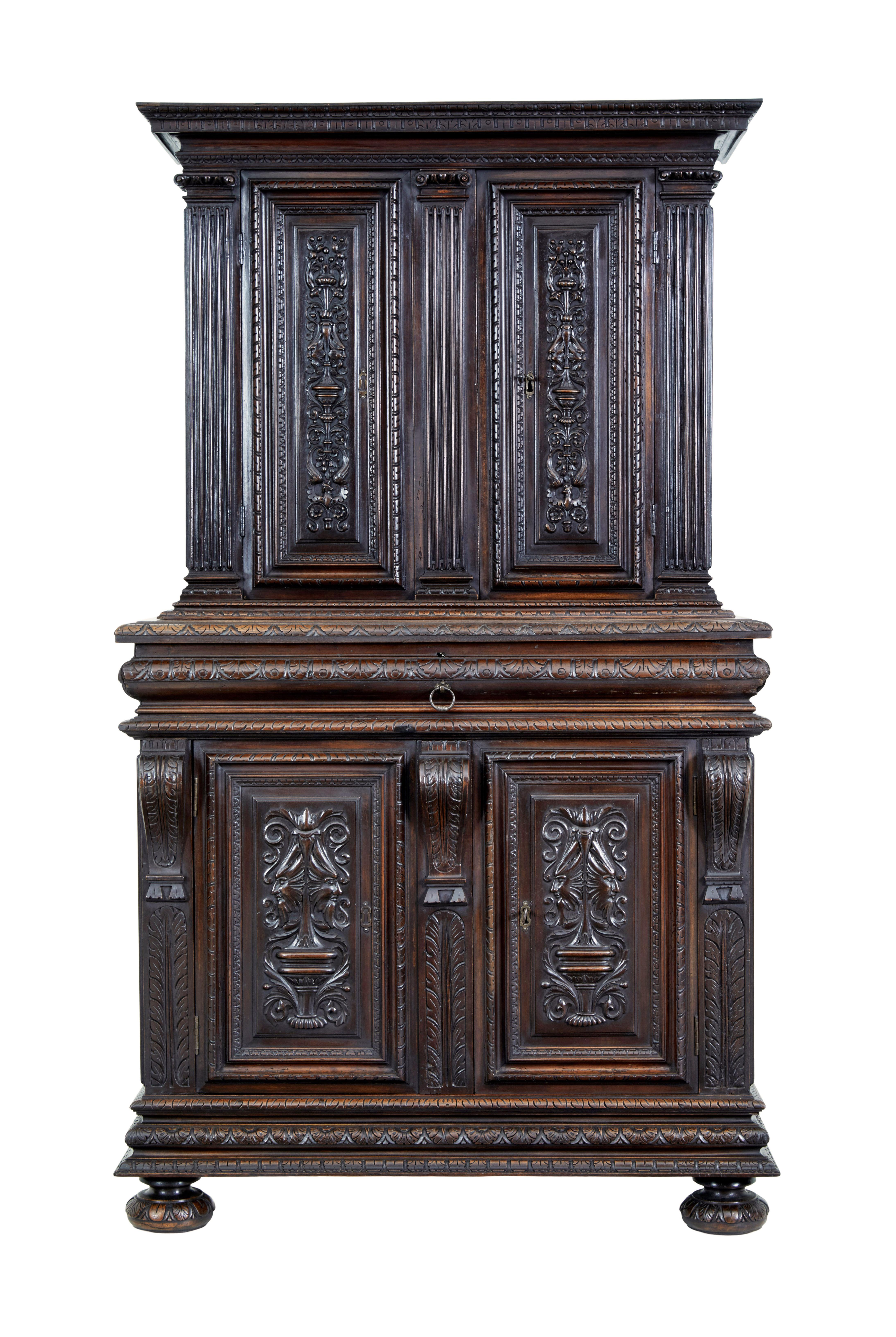 Carved Mid-19th century profusely carved French walnut cabinet For Sale