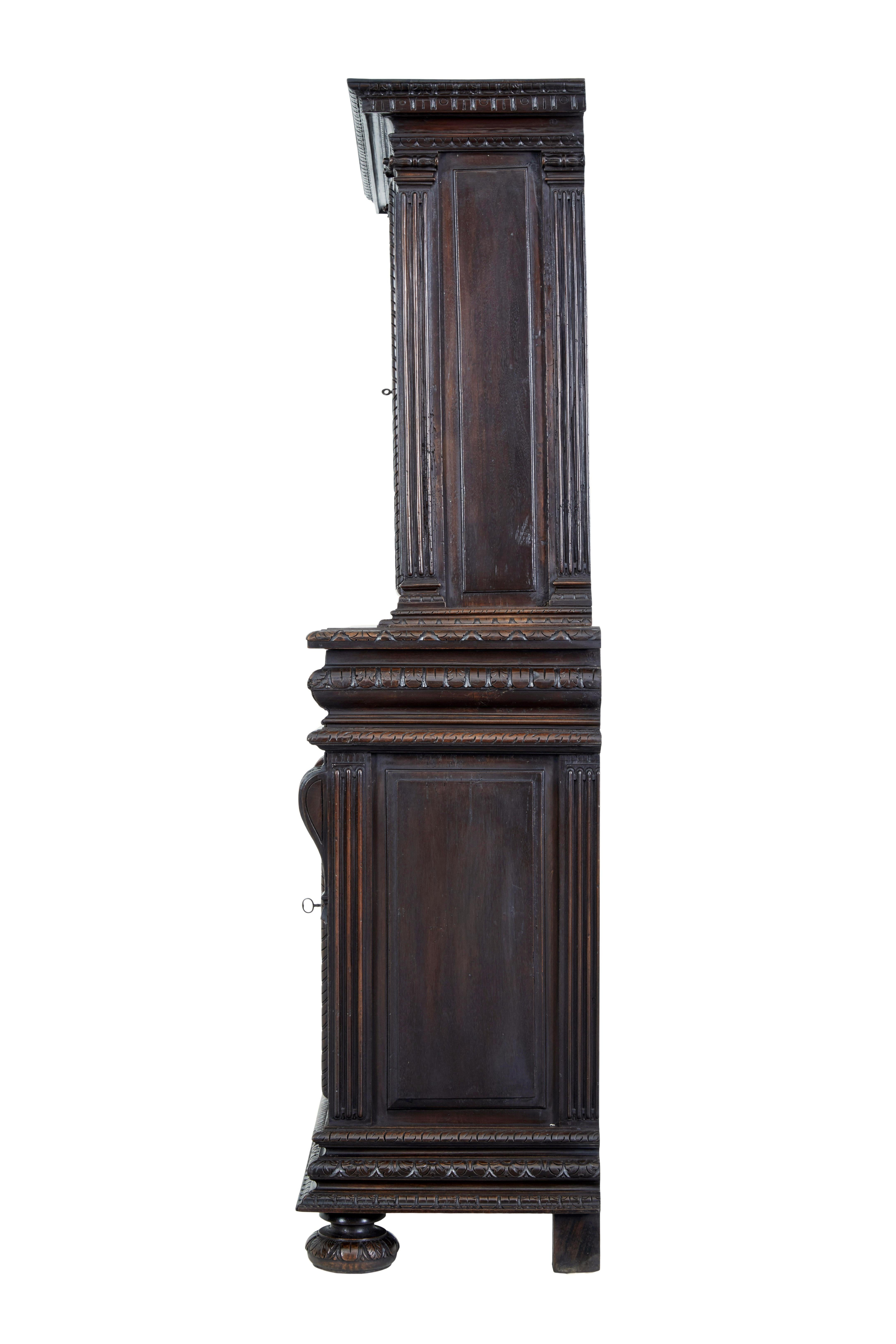 19th Century Mid-19th century profusely carved French walnut cabinet For Sale