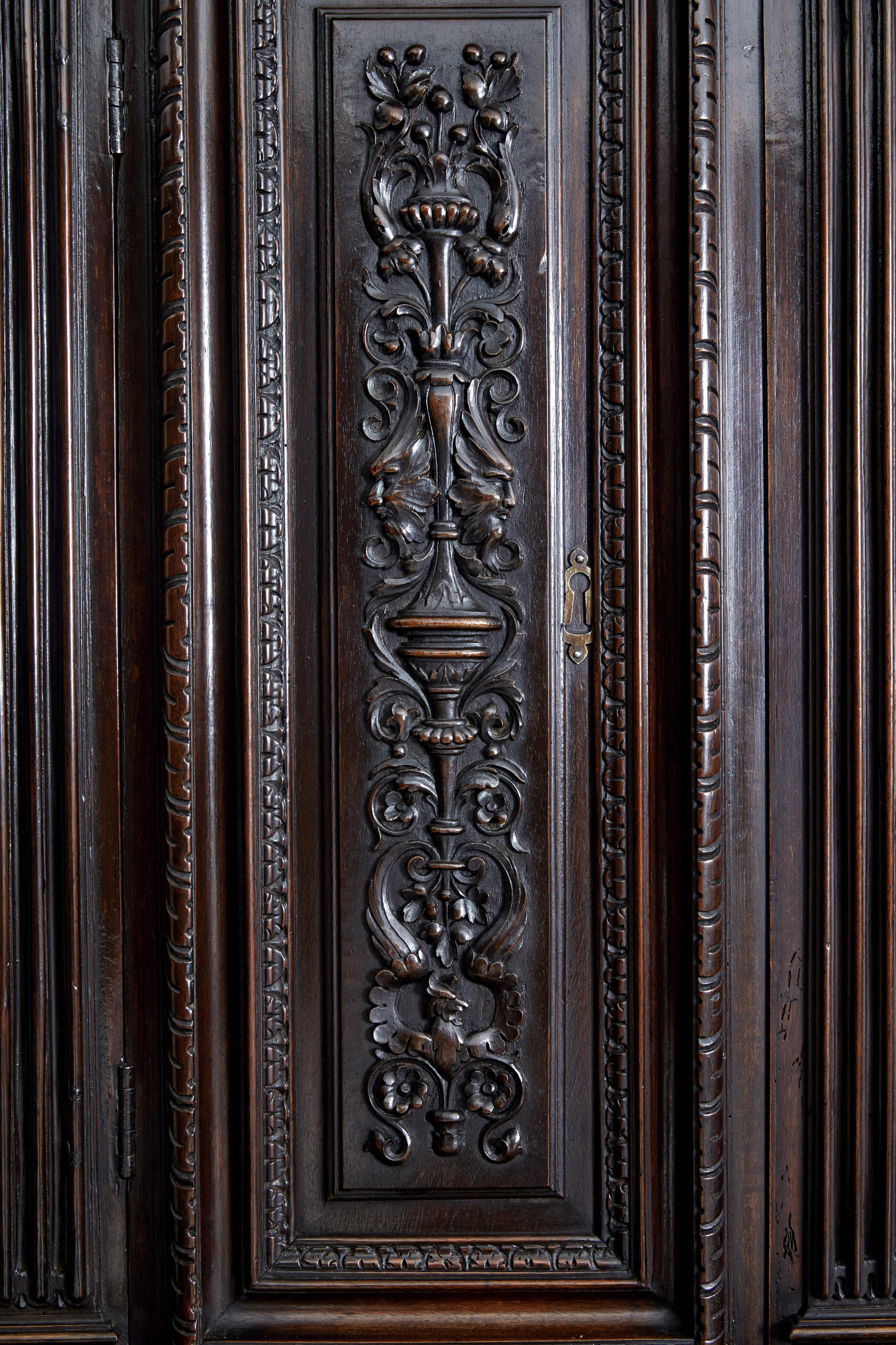 Mid-19th century profusely carved French walnut cabinet For Sale 2