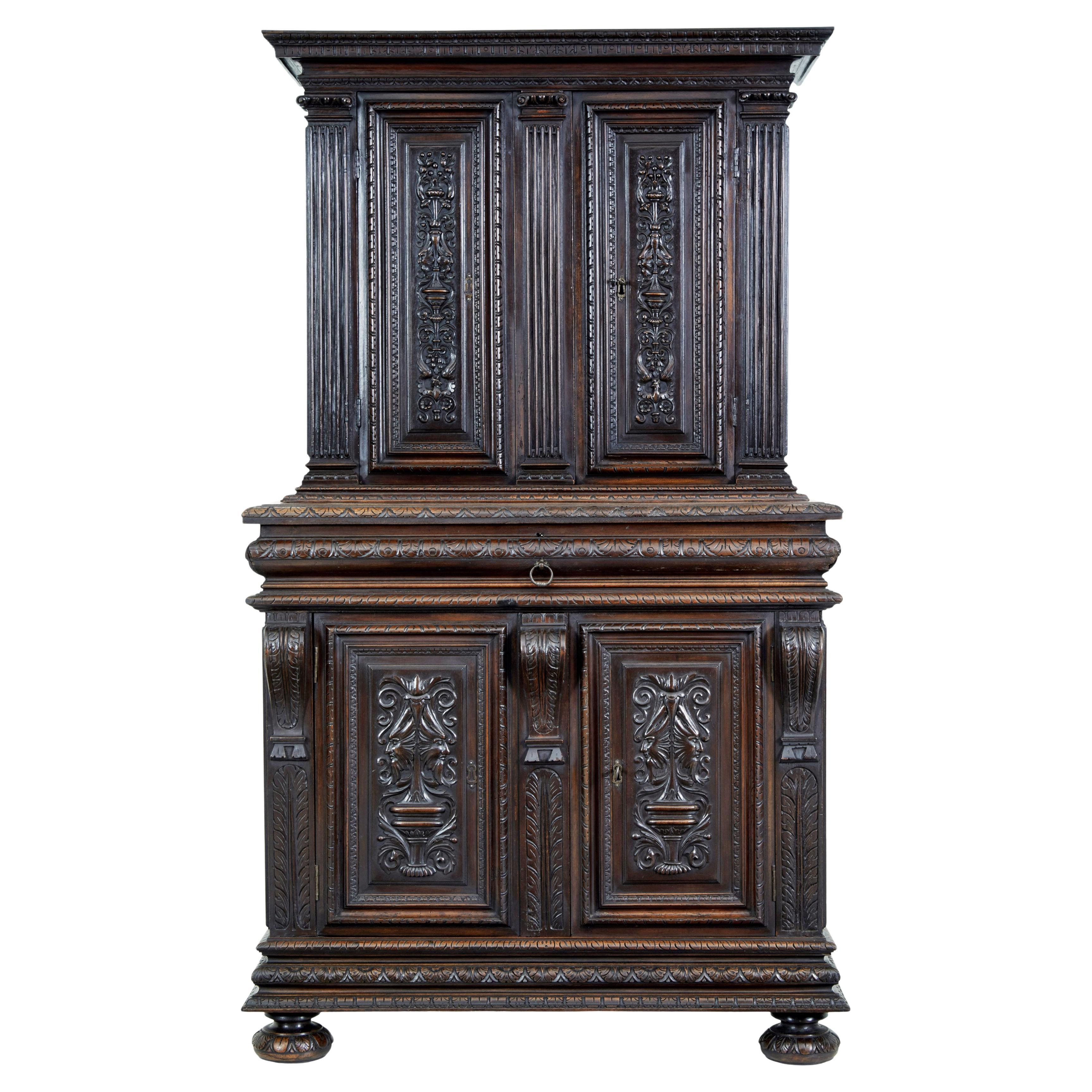 Mid-19th century profusely carved French walnut cabinet