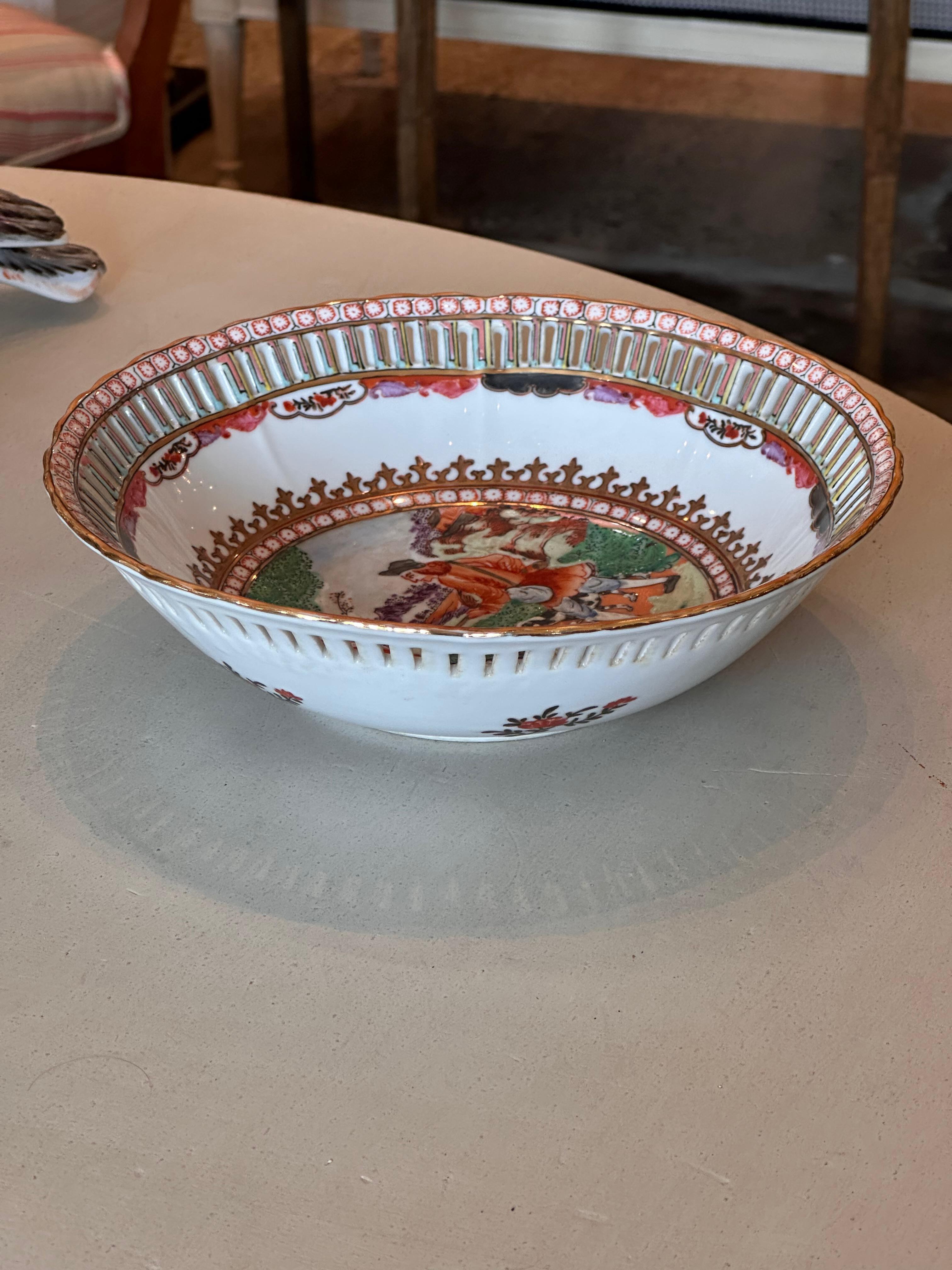 A beautiful reticulate bowl decorated with a hunter. Made in the Mid 19th Century