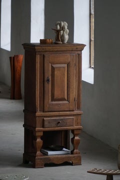Mid 19th Century, Rustic French Solid Oak Cabinet with Paneled Door, Baroque
