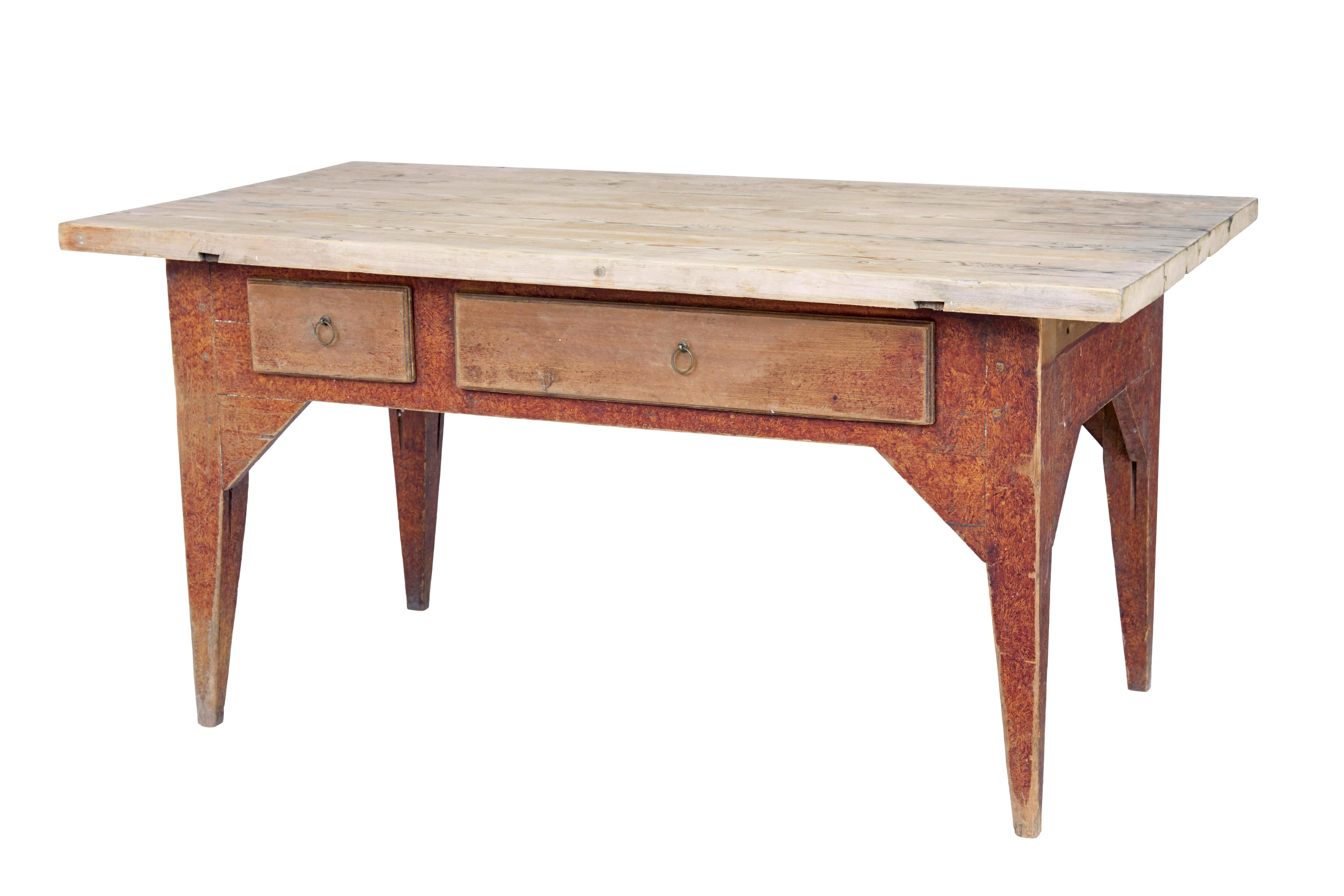 Mid 19th century rustic painted pine kitchen table circa 1850.

Good quality traditional swedish pine table with associated top.

Thick 4 plank top surface with expected surface marks and patina from use.  Standing on a rag work painted base made in