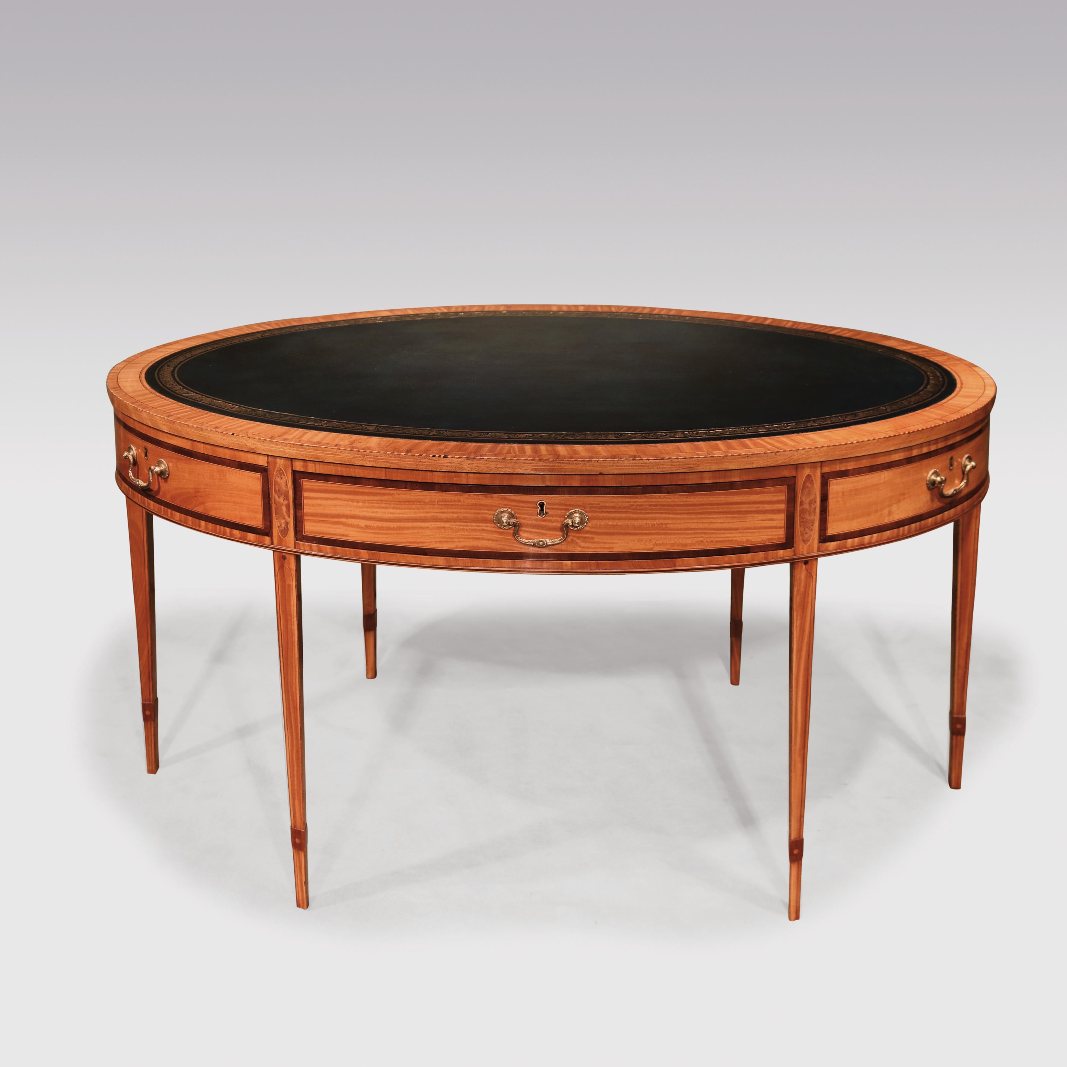 English Mid-19th Century Satinwood Oval Writing Table in the Sheraton Manner
