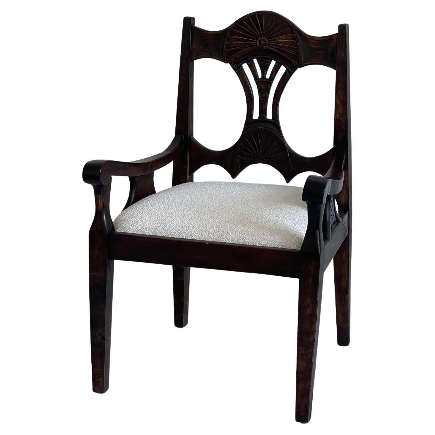 Elegant 19th century Scandinavian Art Nouveau armchair in solid stained oak upholstered in premium boucle fabric. 

Despite its age, this armchair is in remarkable condition, a testament to the quality of materials and craftsmanship.Carefully