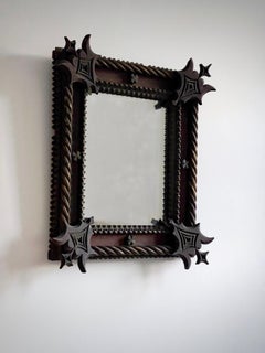 Mid-19th Century Scandinavian hand crafted mirror in Gothic style in hard wood.