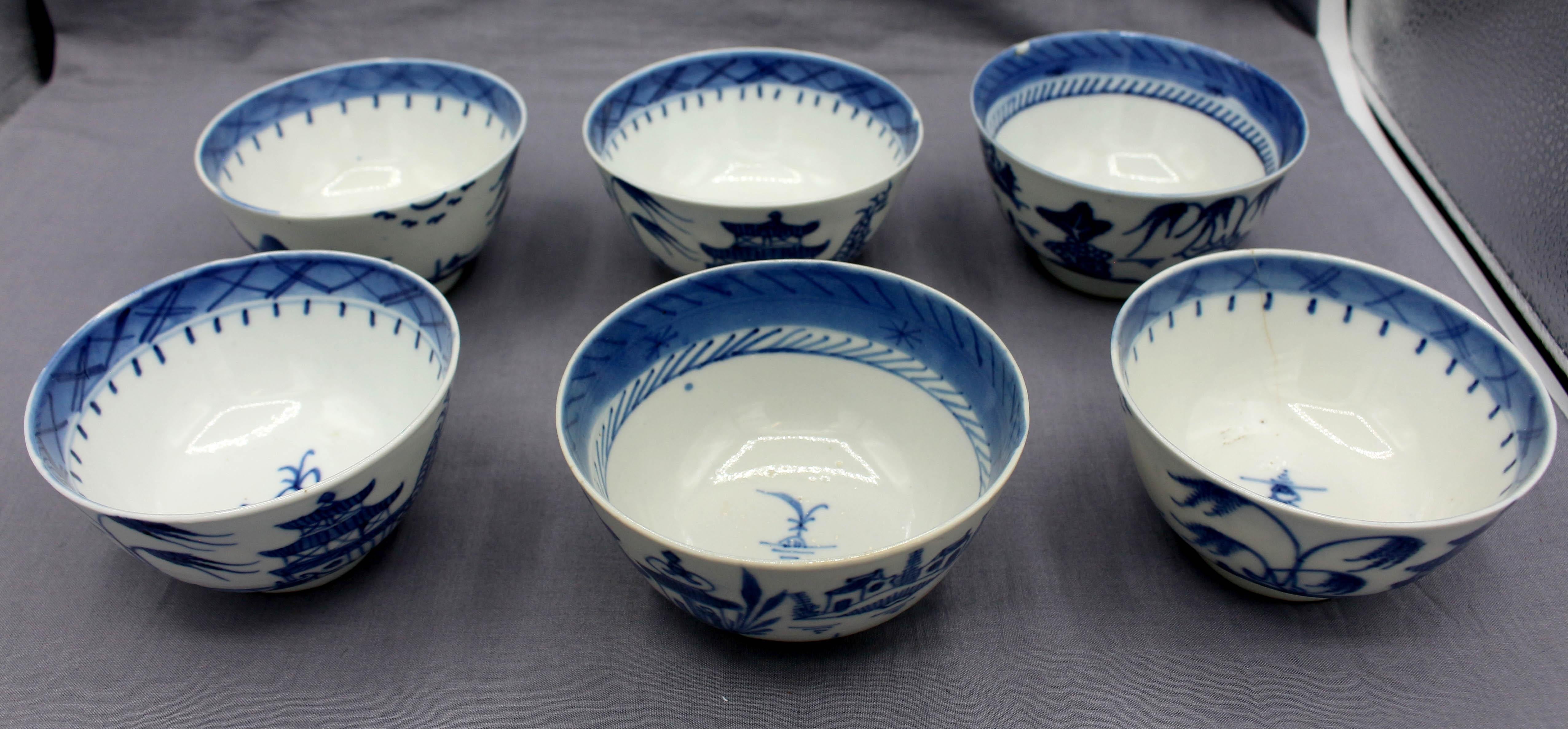 Mid-19th century group of 6 Blue Canton porcelain rice or soup bowls, Chinese export. Some hairlines & nicks. Fine, thin potting. 1 with hairline & chip; 2 with minor rim nick; 1 with underglaze rim roughness.
4 3/8