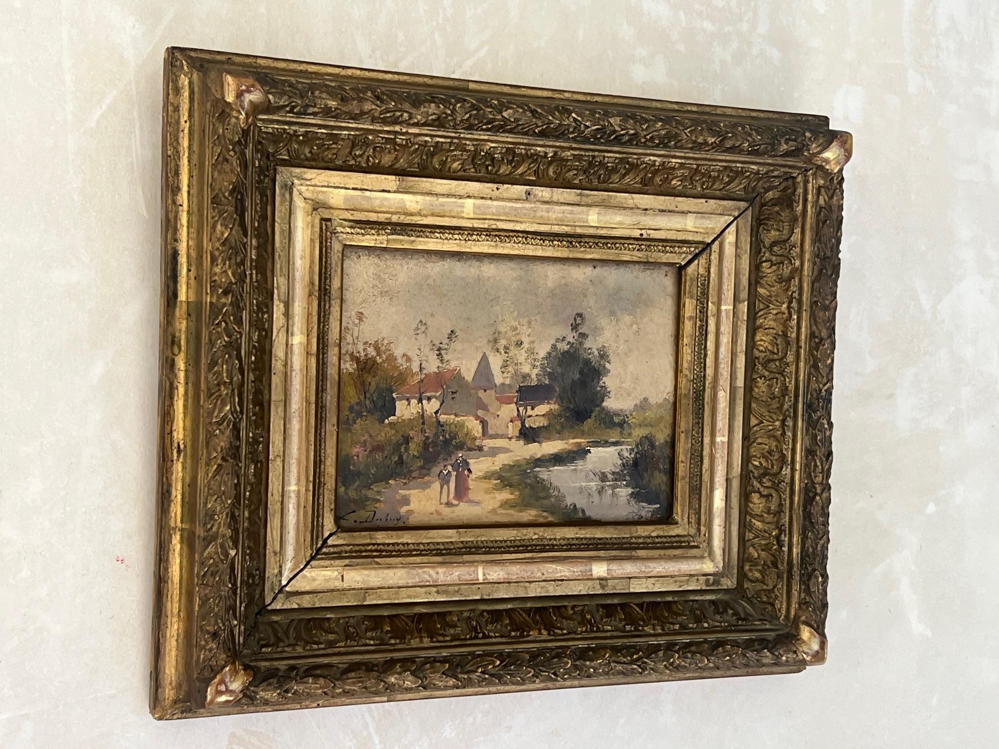 Huile sur bois peinte et signée par l'artiste en France vers 1850.  Richement encadré dans un cadre en bois profondément travaillé à la main avec des détails dorés. La peinture en plein air représente une scène bucolique de personnes se promenant au