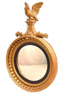 Espejo convexo pequeño de madera dorada de mediados del siglo XIX