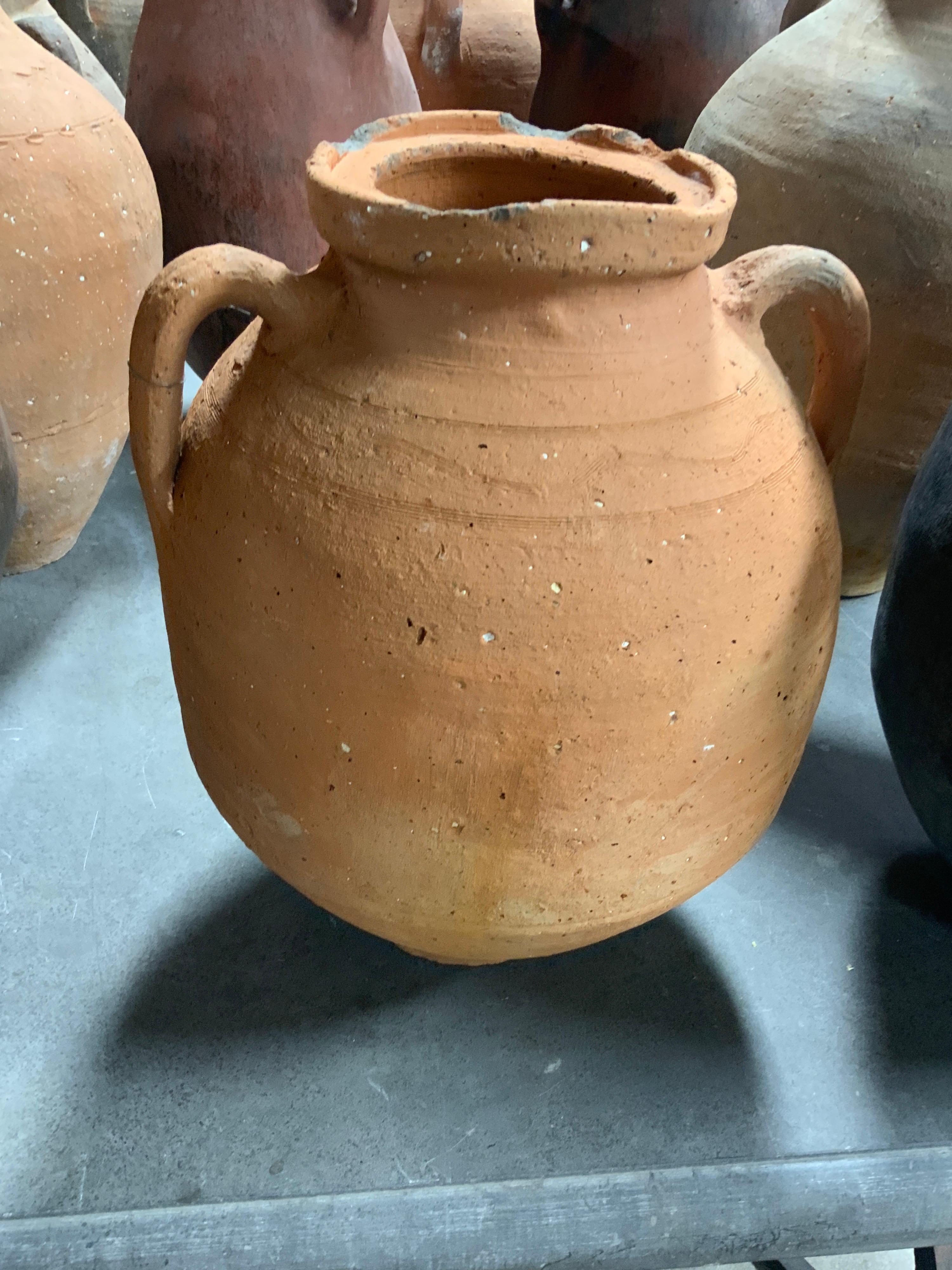 Hand worked small terracotta water vessel. Item originates from Greece and dates back to the 1850s.