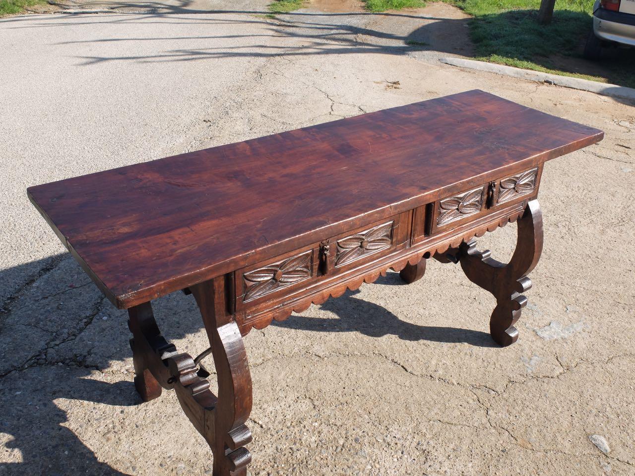 This beautifully crafted mid-19th century poplar library table was found in the village of Vullpellach, located in the province of Girona's Costa Brava region of Catalonia, Spain.

Featuring a single board 1 3/8