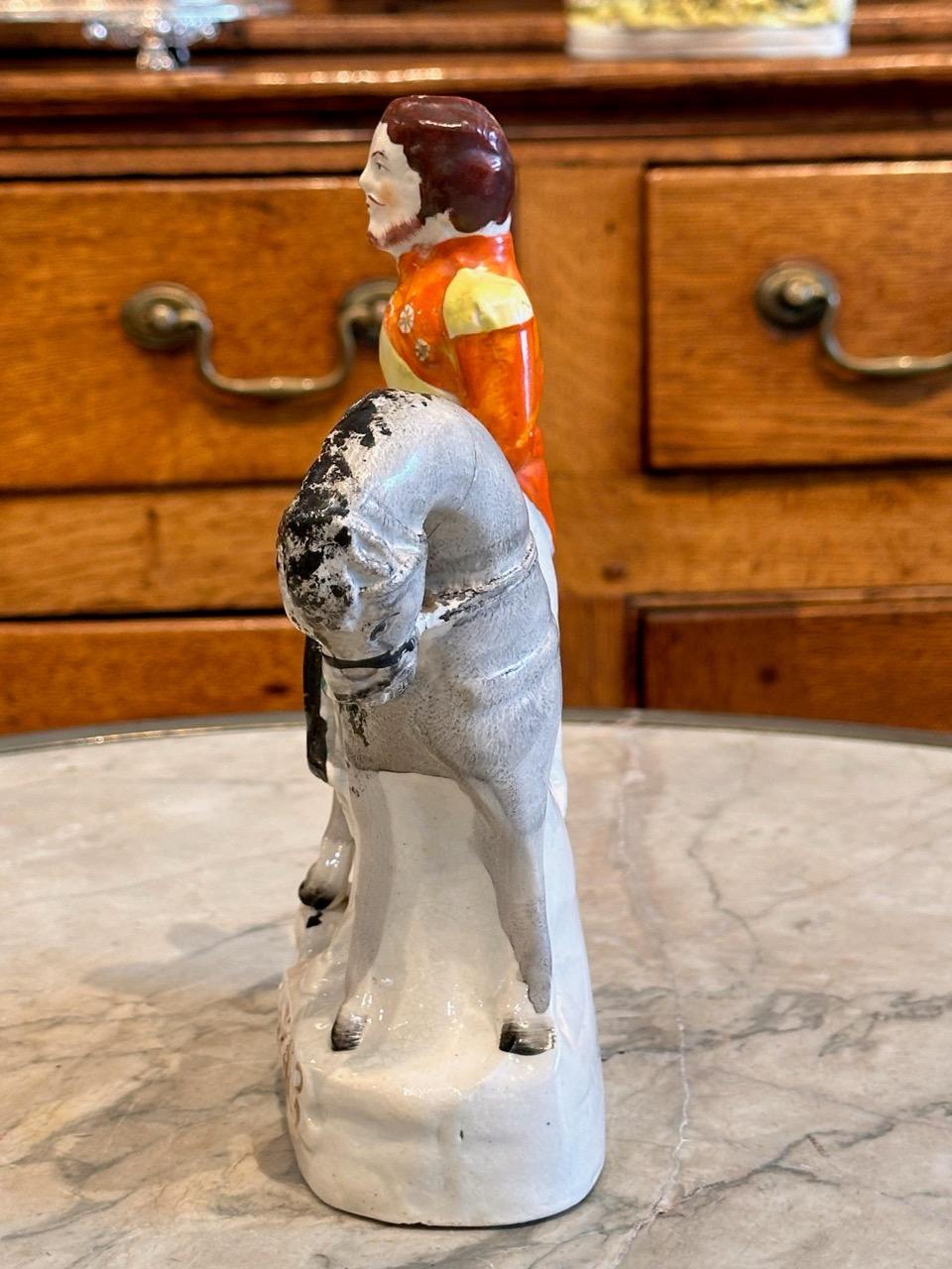 A nice piece of Staffordshire. Horse and rider. Circa Mid 19th Century.
