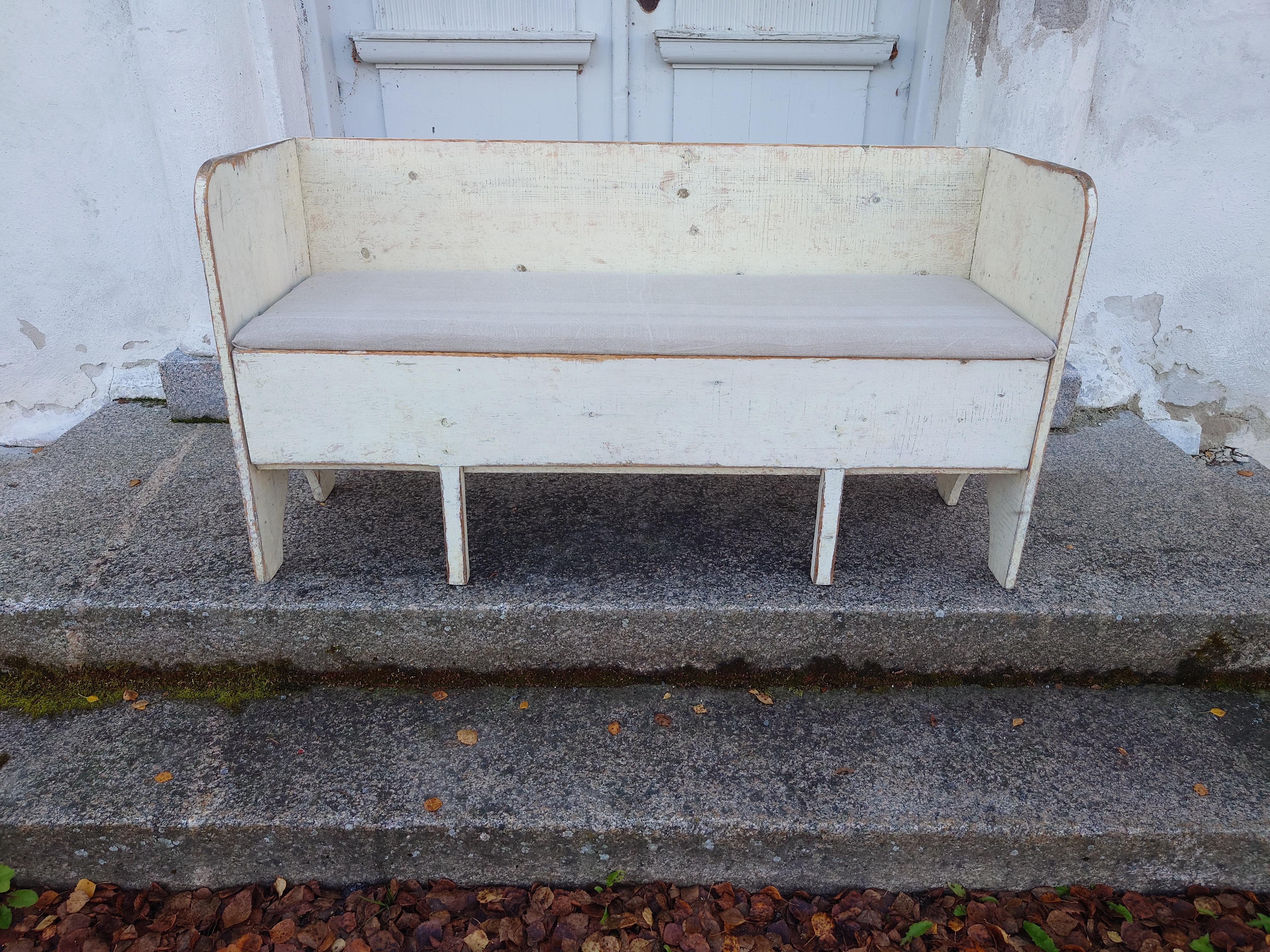  A charming antique sofa from the mid-1800s. The sofa  is from Boden Norrbotten, Northern Sweden It's petite and compact, perfect for smaller spaces. 
The sofa has a foldable lid that provides convenient storage. It's also extendable, making it