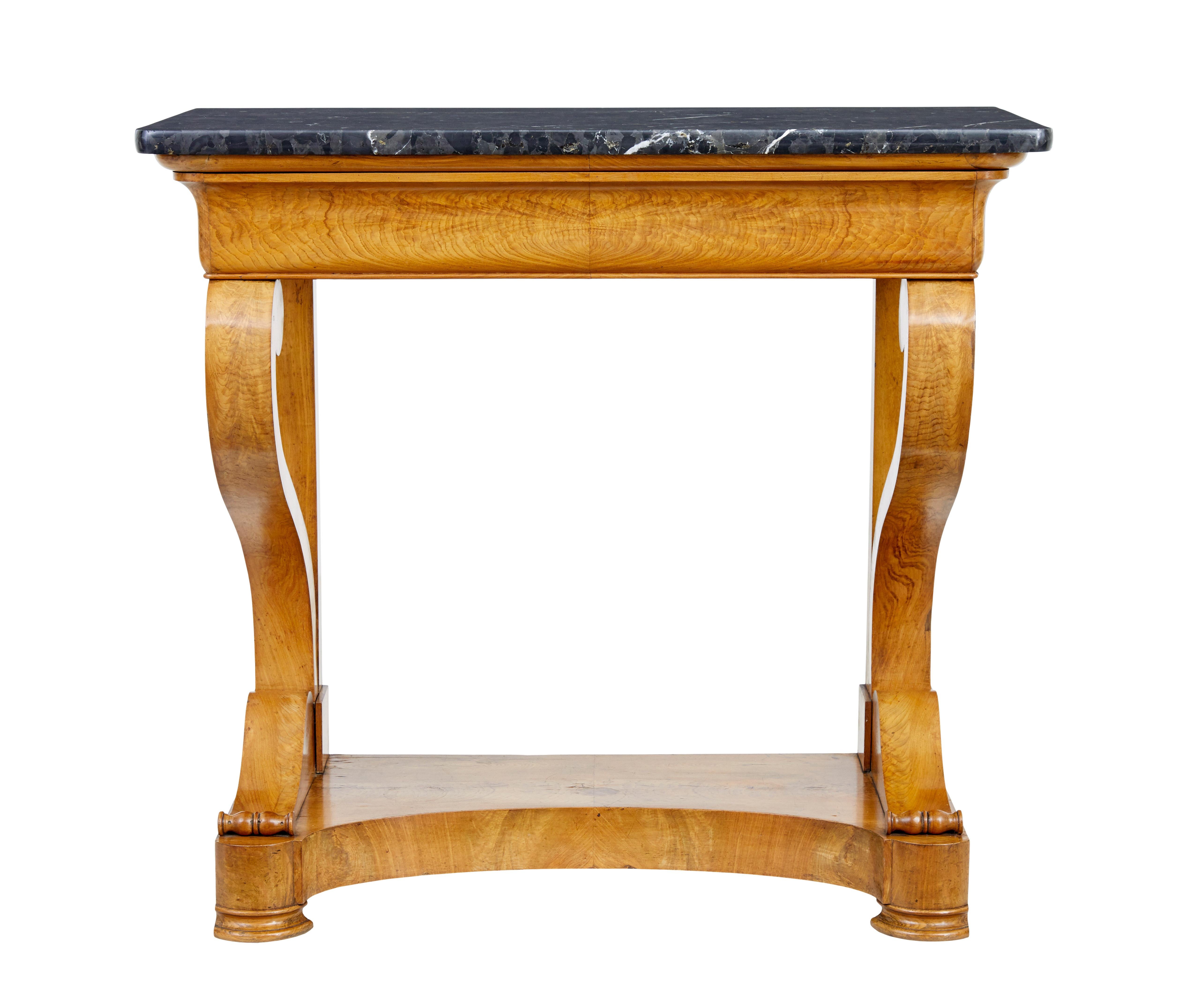 Mid 19th century Swedish elm marble top console table circa 1860.

Fine quality console table of grand proportions.  Shaped marble top standing on an elm base.  Single concealed drawer below the top surface. Scrolled front legs with serpentine
